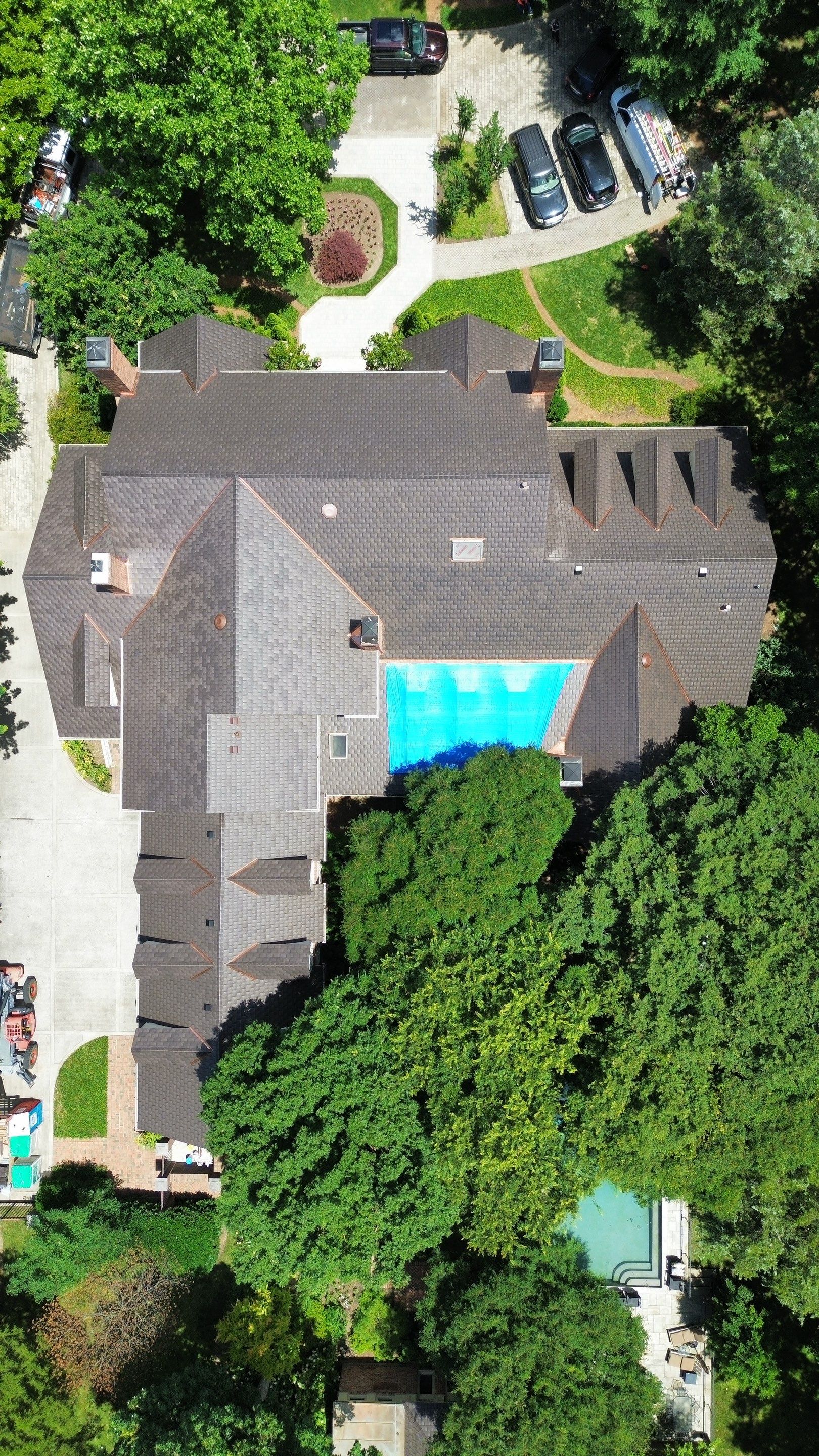 Residential Roofing Installation Using Enviroshake Synthetic Slate by Undersun Roofing 