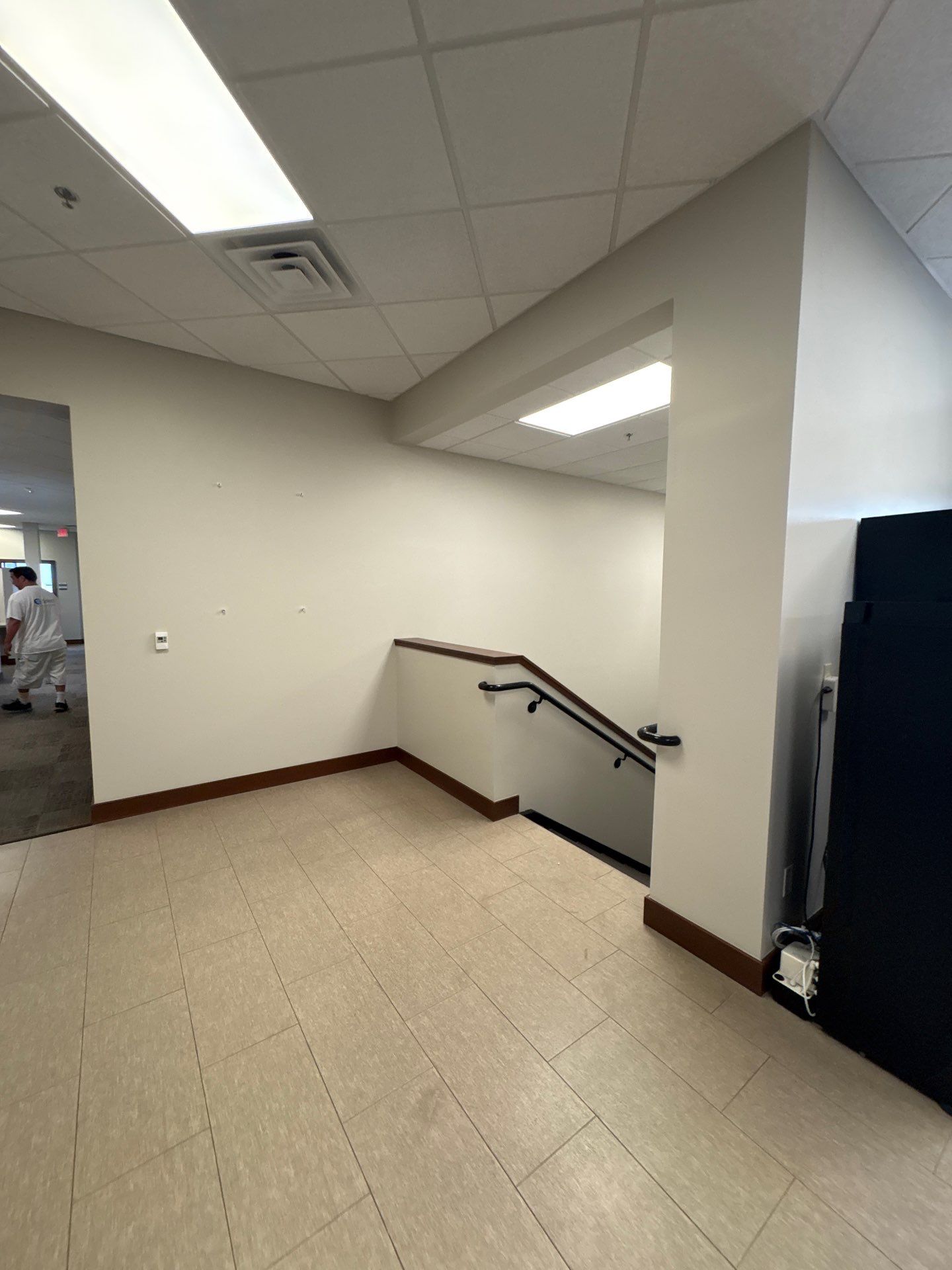 Commercial Office Interior Remodel and Modern Suite Refresh in Sioux Falls by Select Painting, Coatings & Garage Cabinets