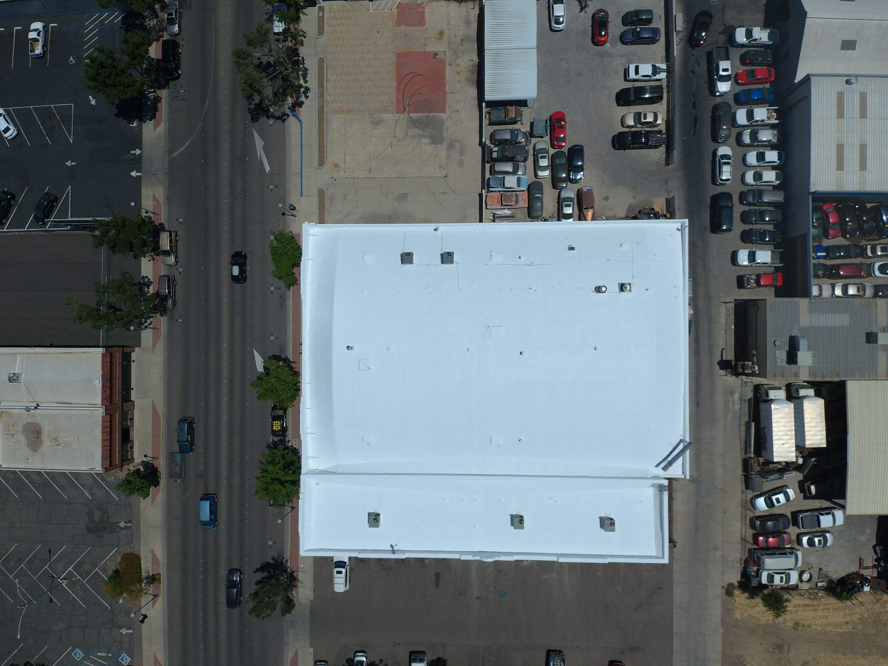 Spray foam and coatings using Conklin Benchmark/PUMA XL coatings and spray foam by Straight Edge Roofing Inc