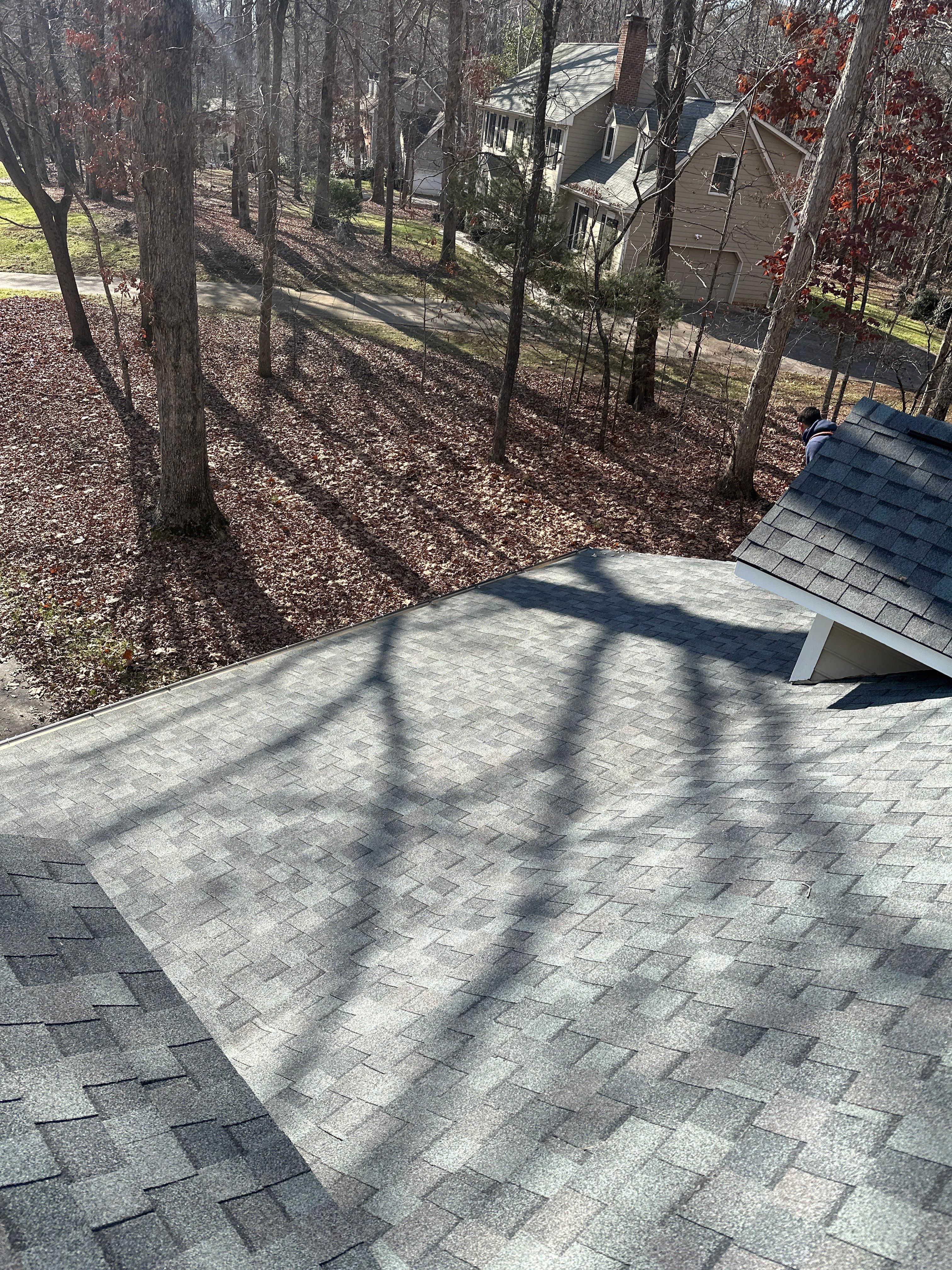 Leaf removal from gutters and yard by Martinez Brother’s Nc Landscaping Inc