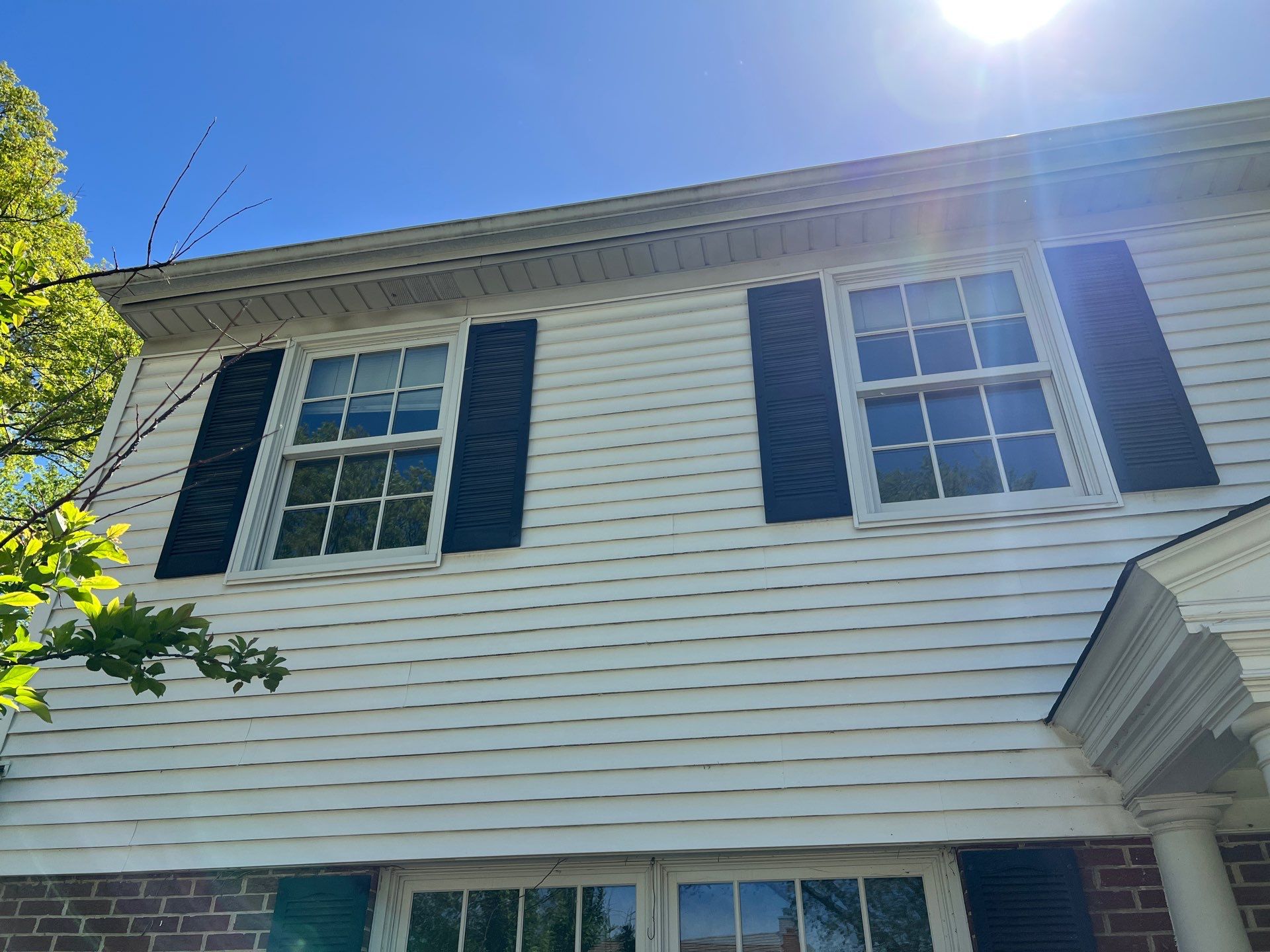 Housewashing  using Algaecide, soft wash soap by Northern Power Washing LLC.