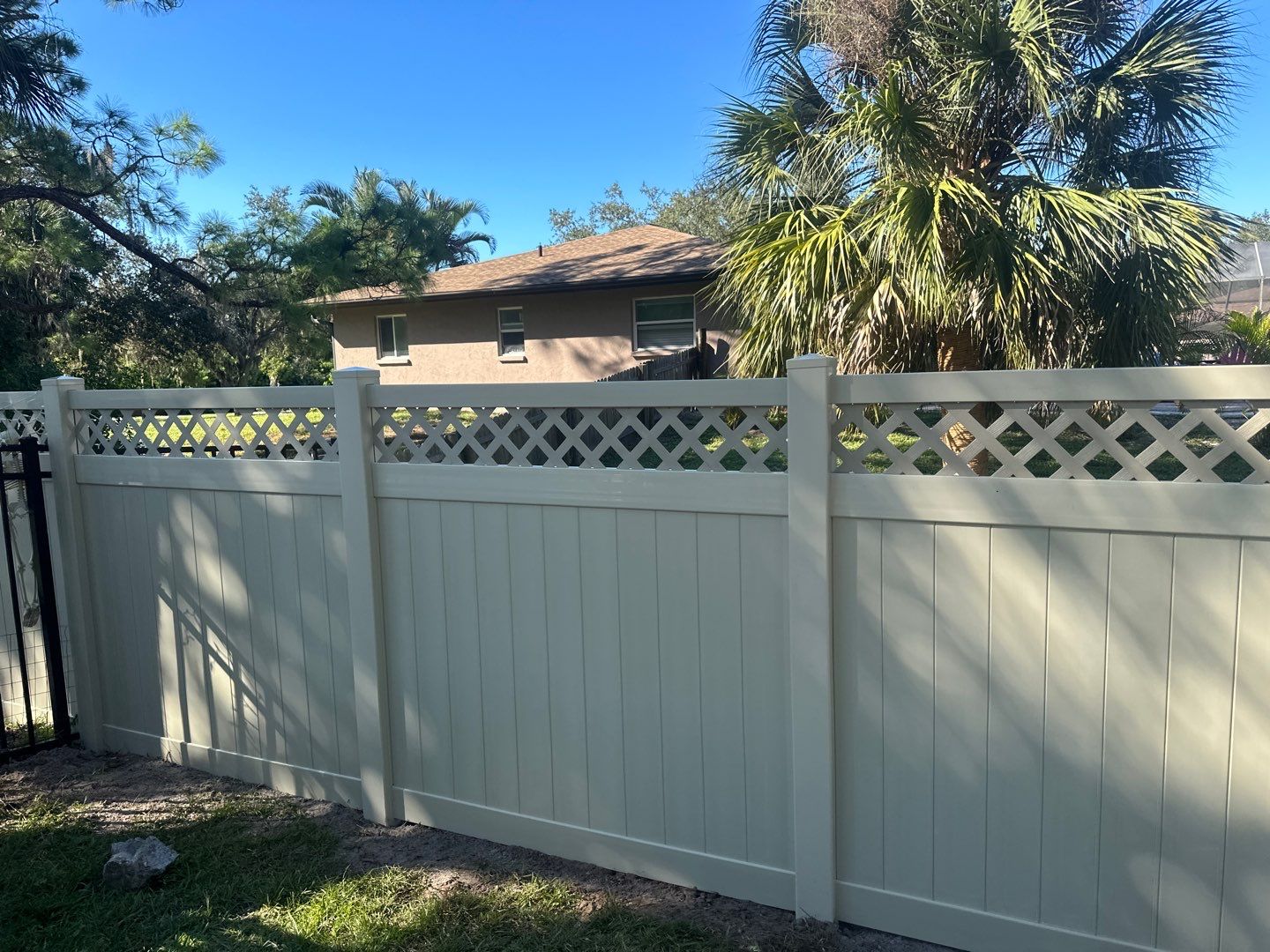 Vinyl Fence Installation using 6Ft Tan Vinyl Privacy Fence with Lattice Top by Asap fence and gates, LLC