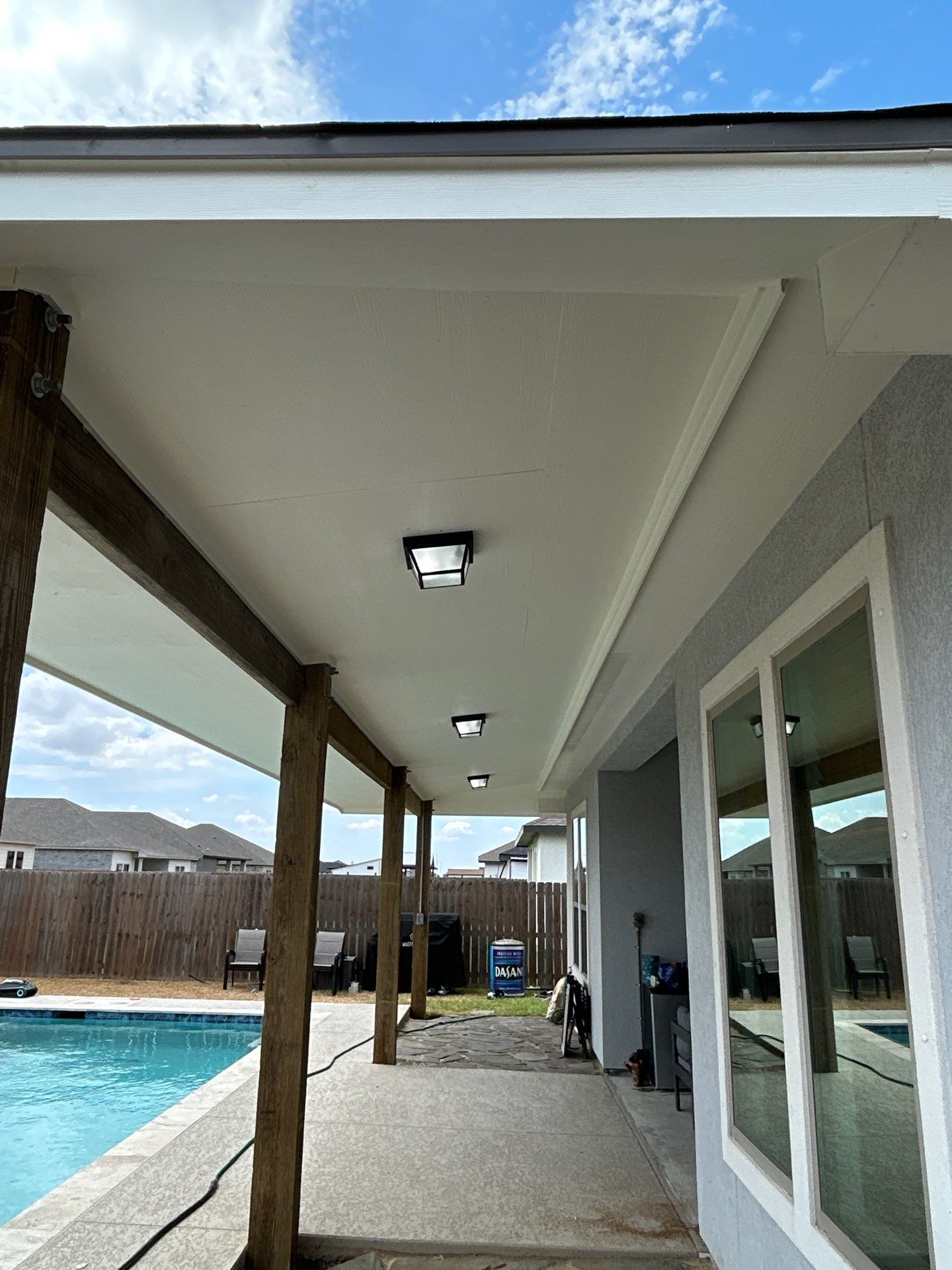Patio Pool Cover by Bayfront Roofing and Construction
