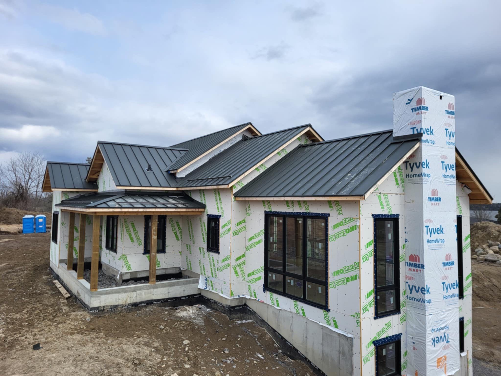 New Home Construction using 16" Standing Seam Panels by Jay Carter Roofing & Sheet Metal