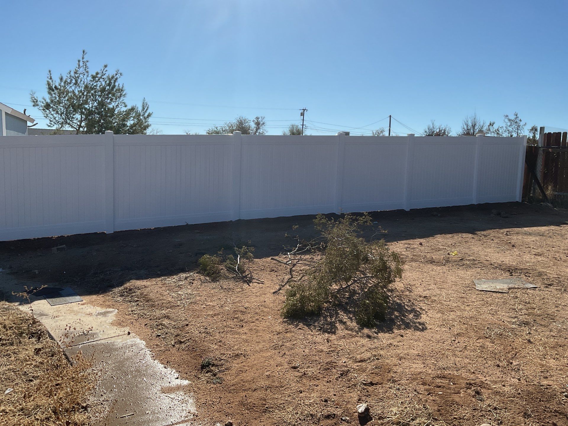 Fence Installation using vinyl and chain link  by Fence Guys Inc. 