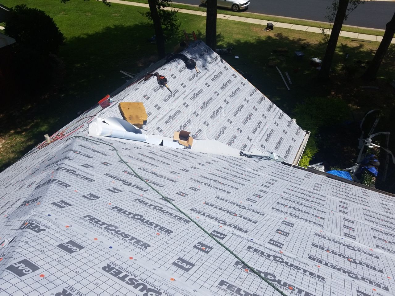 Residential Roofing Installation using Roof Replacement by American Roofing & Construction LLC