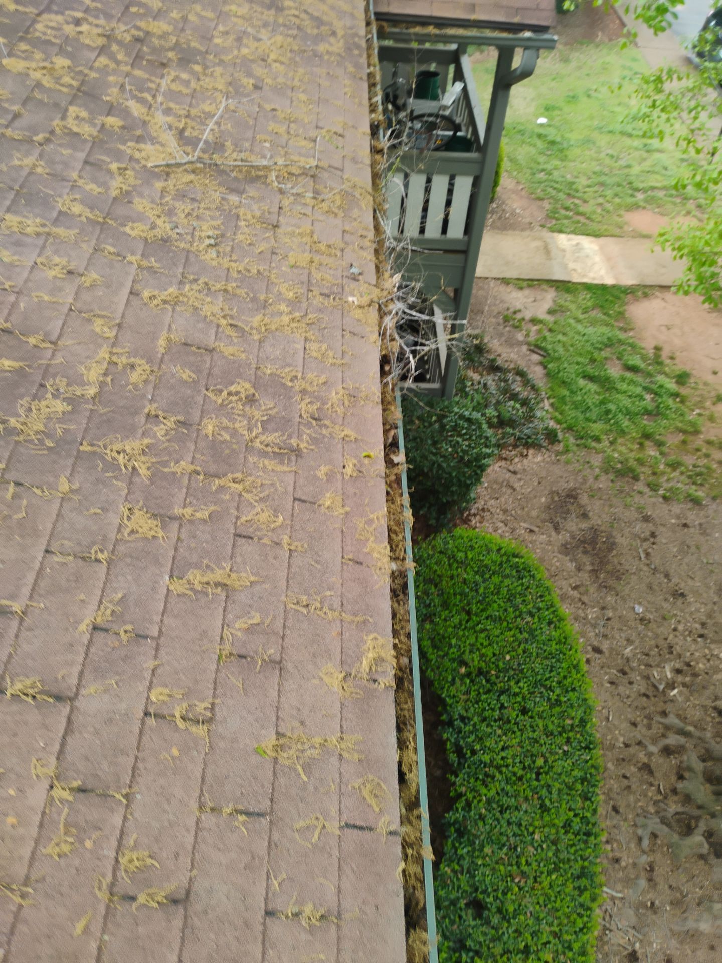 Commercial gutter cleaning Athens, GA before photo with filled gutters
