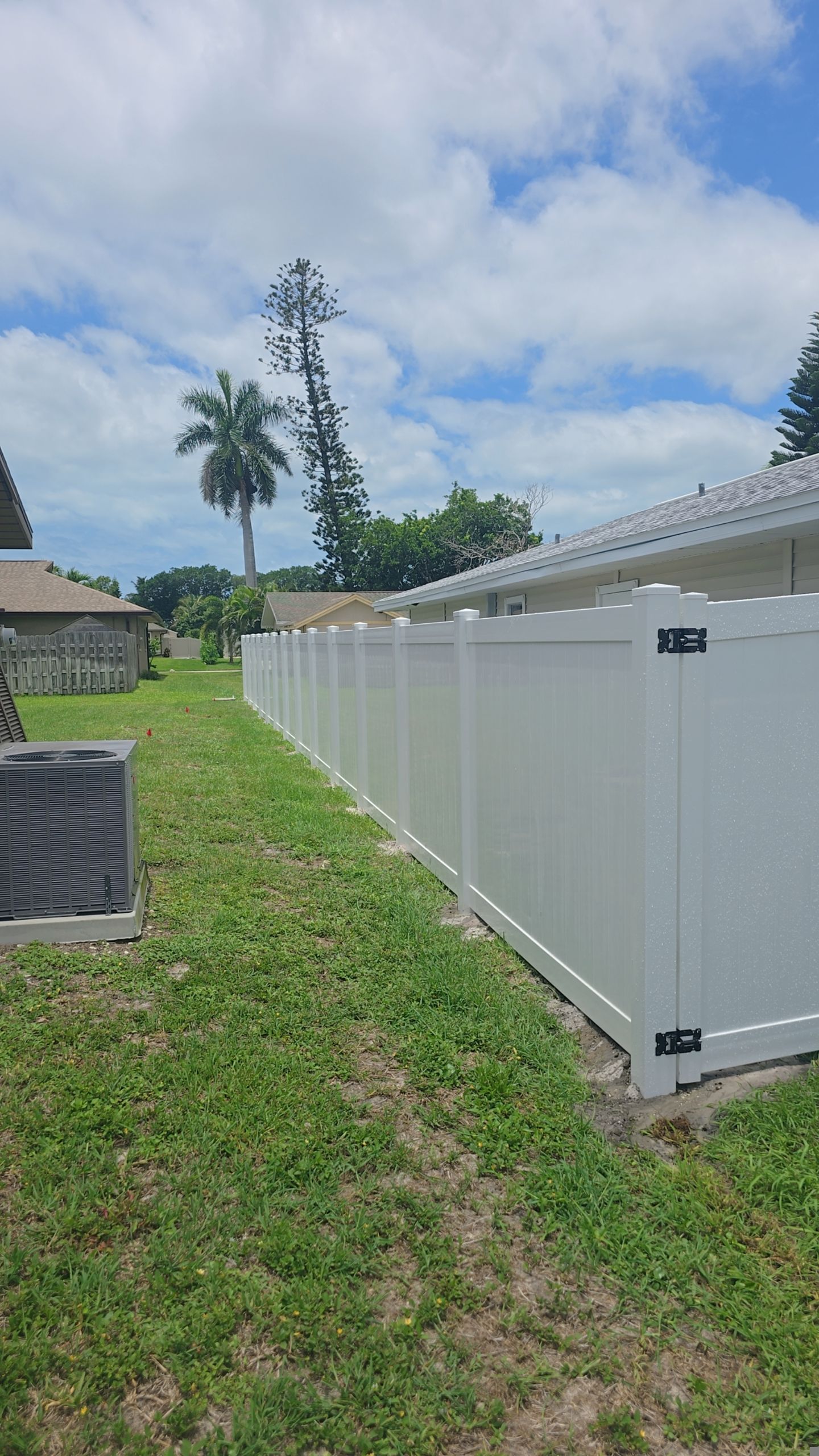 White Vinyl Privacy Fence Installation in Bonita Springs by True Fence LLC