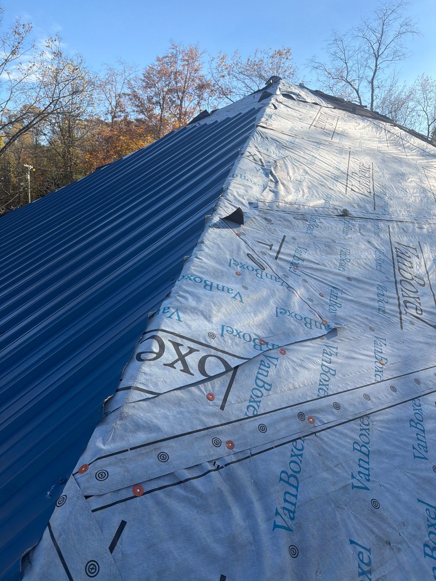 Residential Roofing Installation using Metal by Rainstoppers Roofing