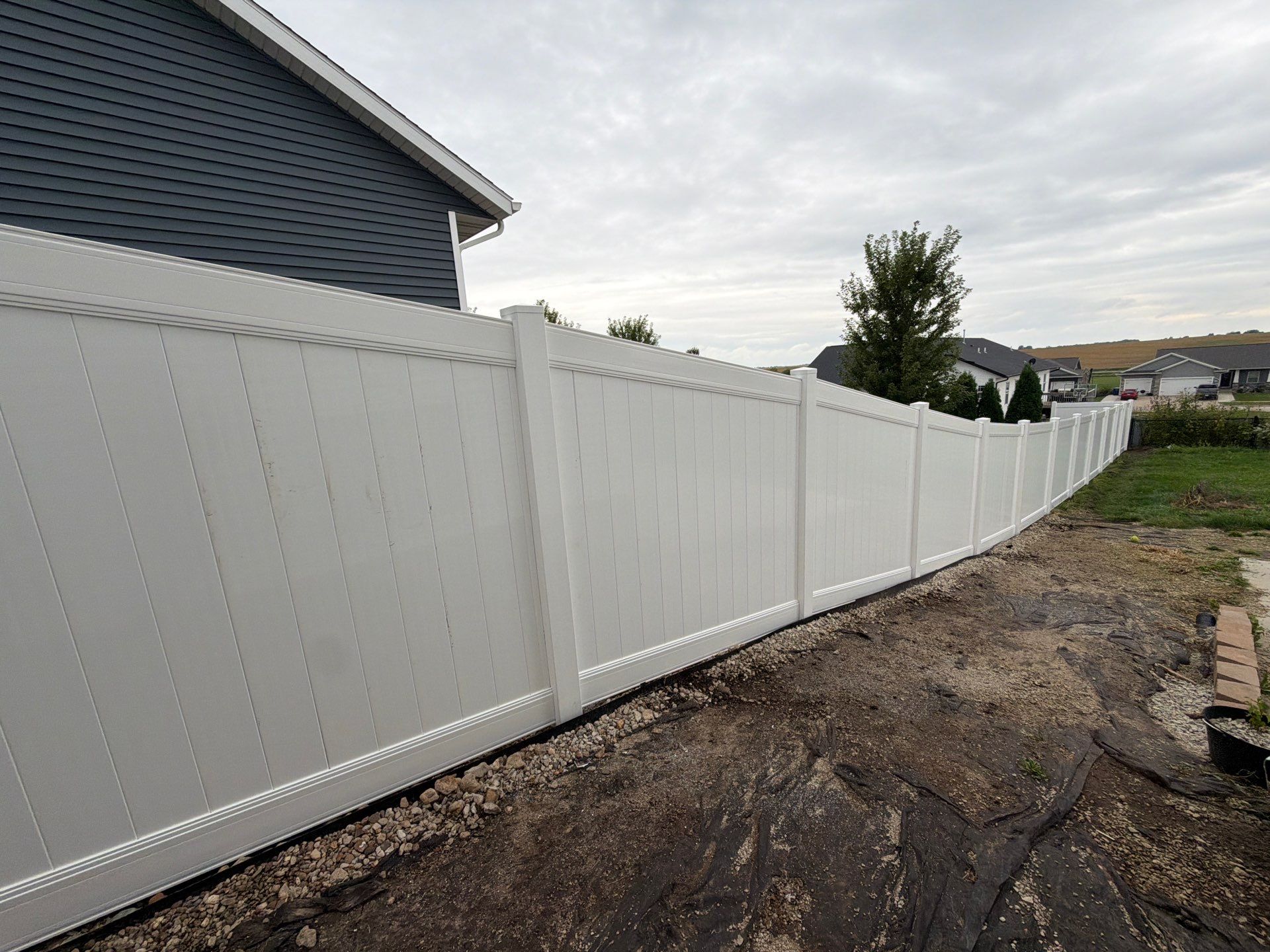 Residential Vinyl Privacy Fence Installation in Urbana by Perfect Picket Fence and Stain