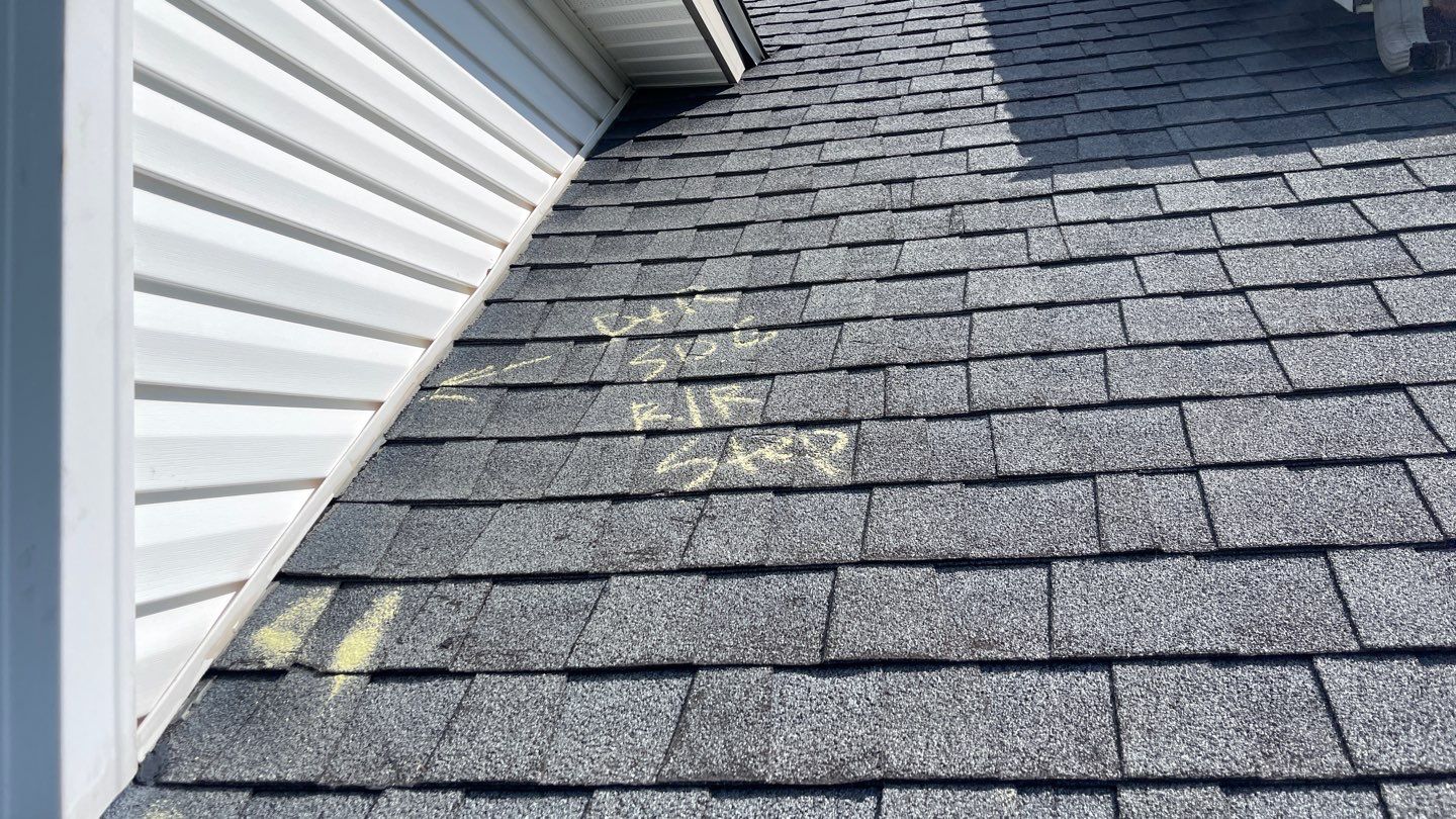 Roof Damage using Certainteed Lifetime Roofing System- Moire Black Landmark Pro shingkes with shadow ridge caps. by BulletpROOF Exteriors