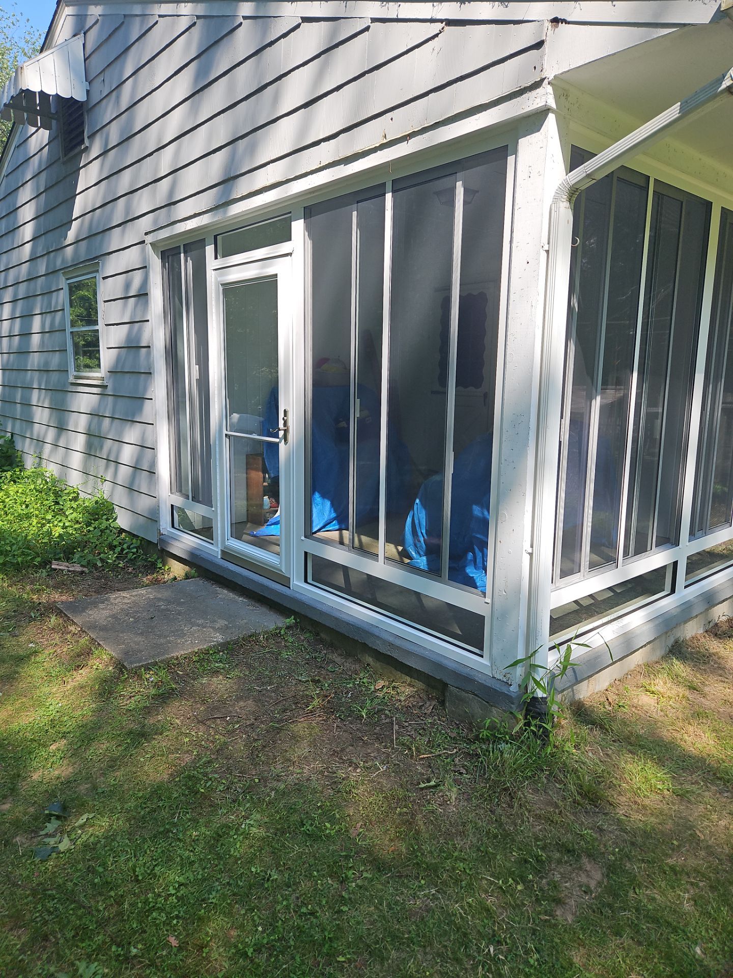 Summer Space Porch Enclosure by DiGiorgi Roofing and Siding Inc