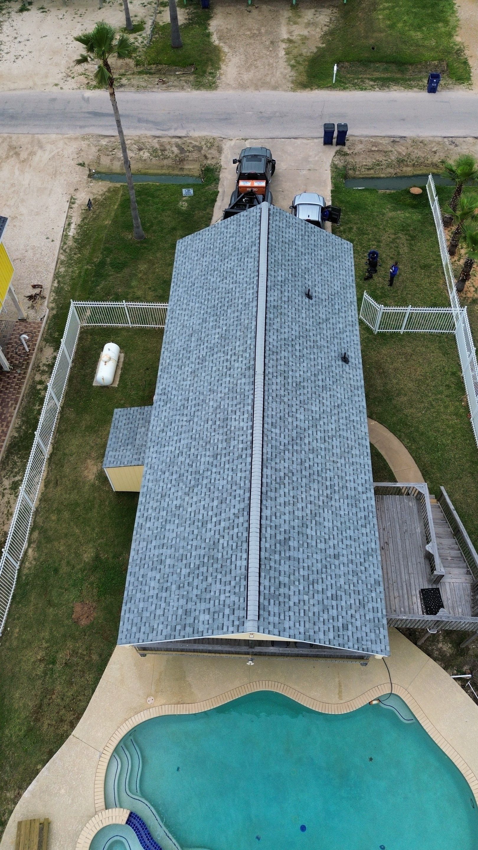 Roof Replacement using IKO Cambridge Dual Grey by CAP Roofing and Construction LLC