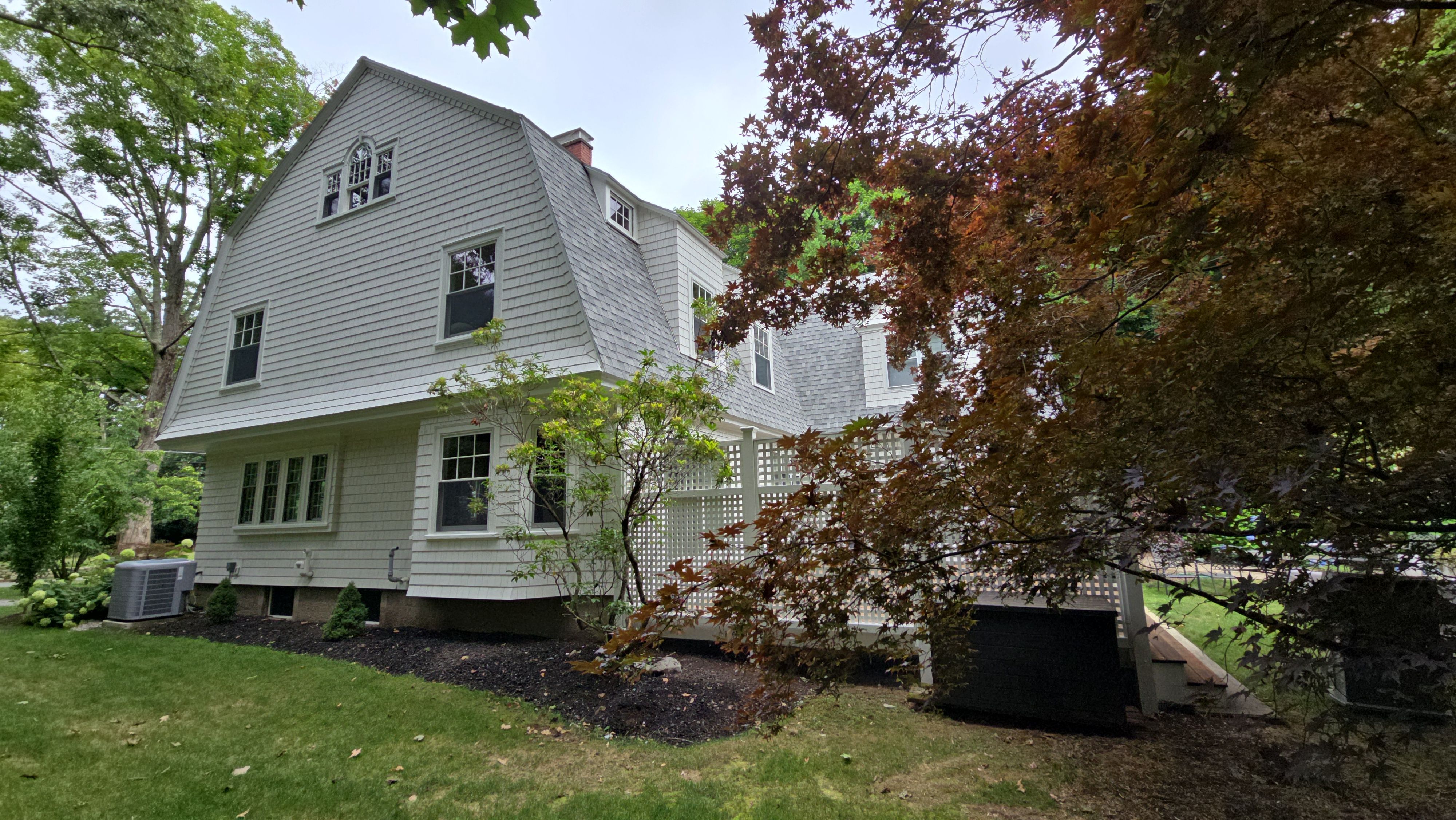 White cedar shingles and windows in Wayland, MA by UBrothers Construction
