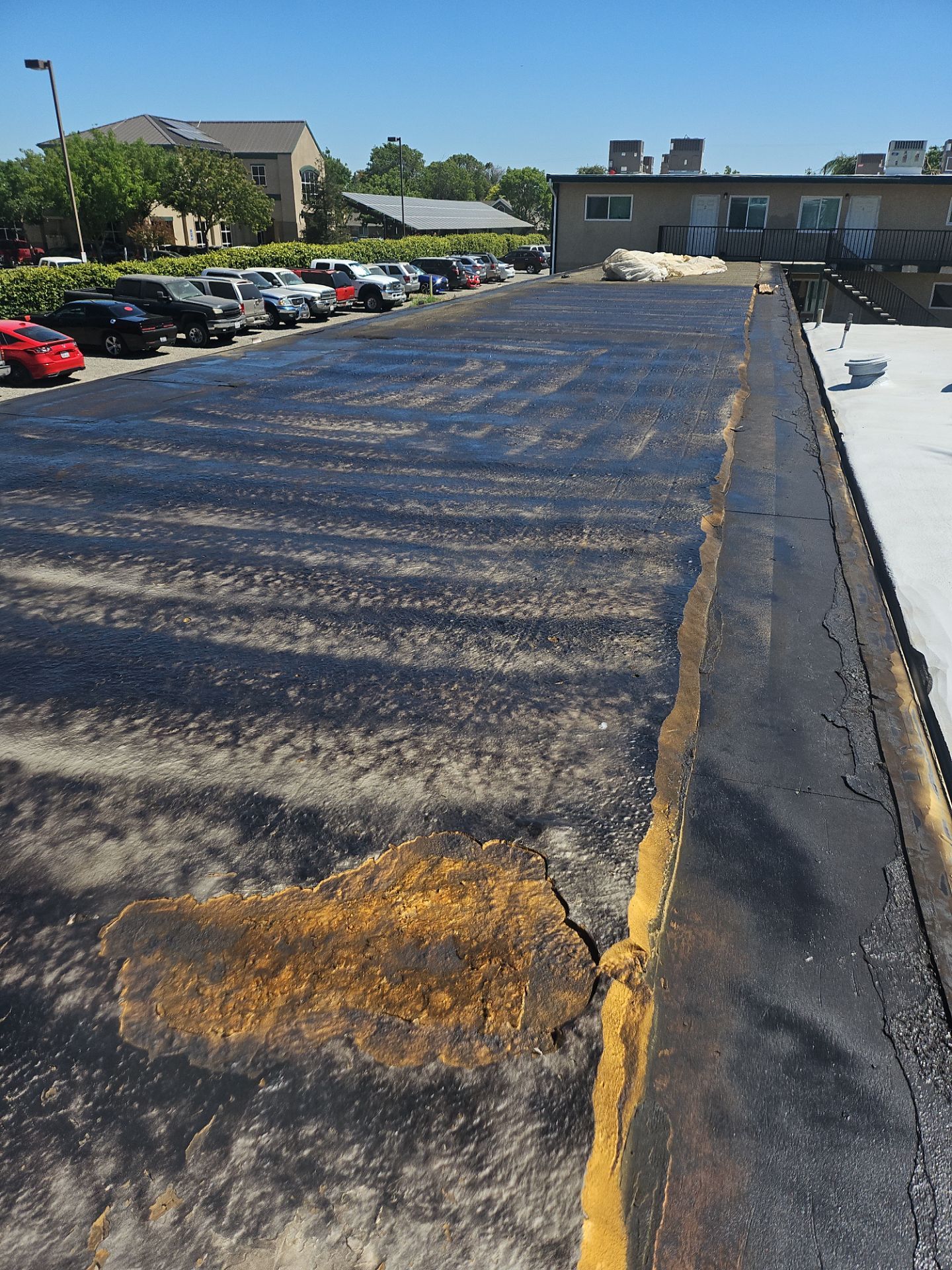 Foam Refurbish using General Coatings acrylic coatings and spray foam by Straight Edge Roofing Inc