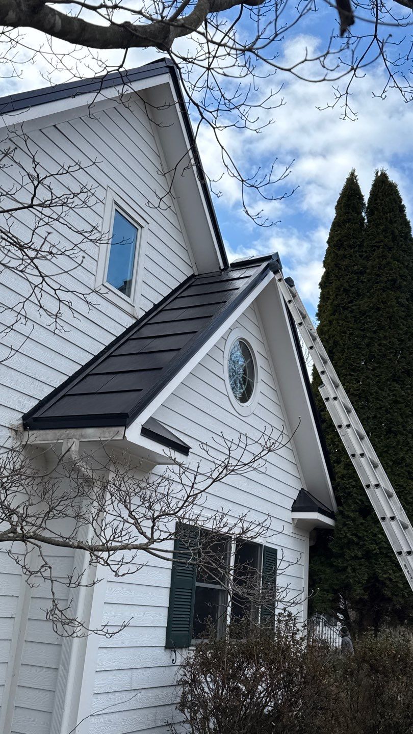 Tesla Solar Roof  using Tesla Powerwall by American Home Contractors