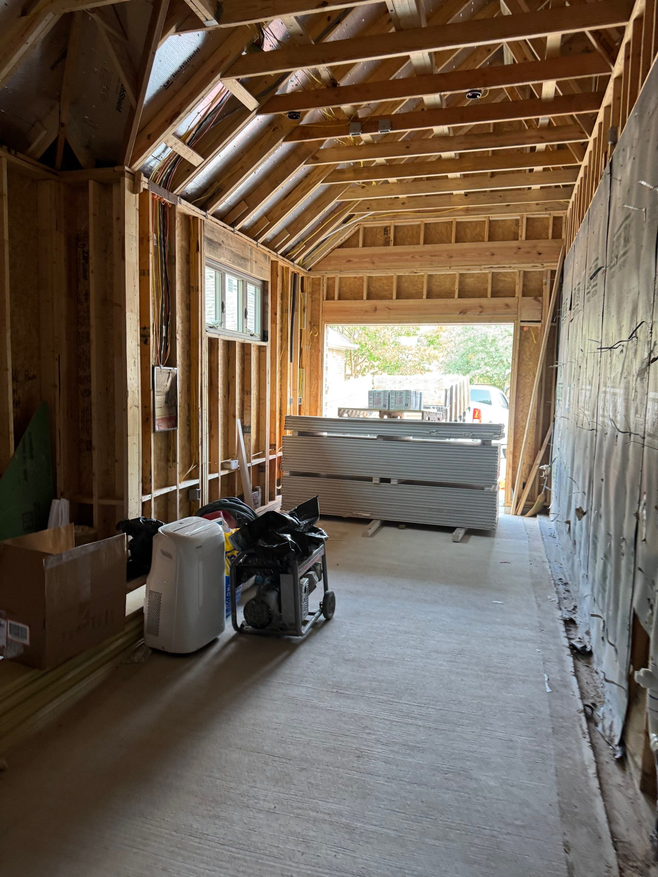 Garage and Pool Bath Addition by SLM General Contractors & Roofing