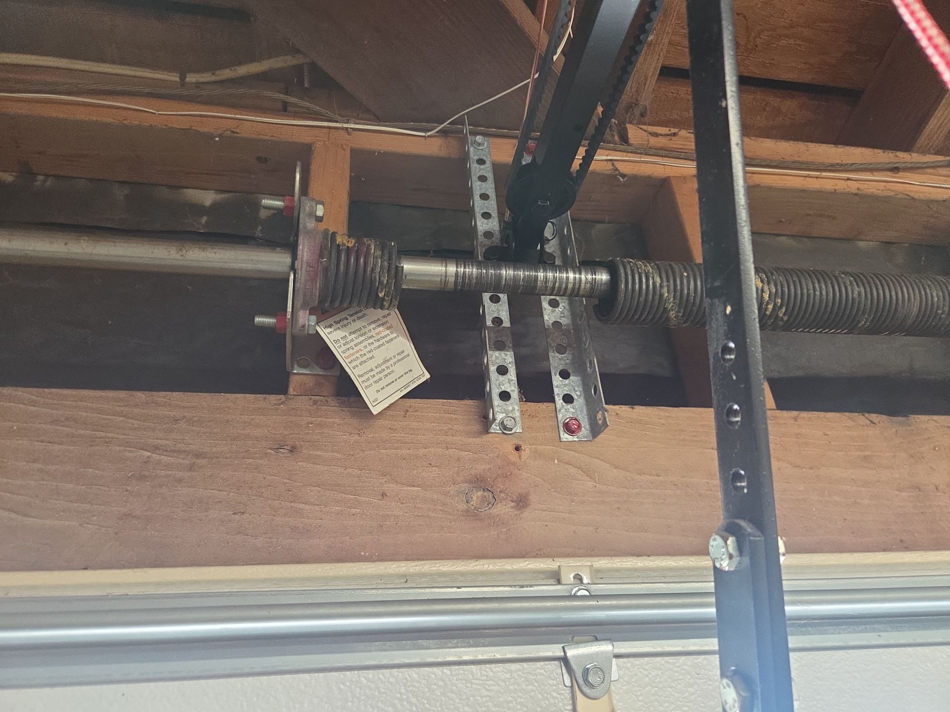 Single spring replacement and track reset and alignment in Danville, CA by Valiant Garage Door