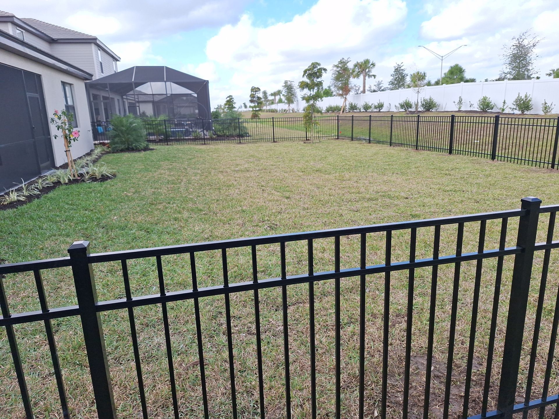 Aluminum Fence Installation using 4ft 3 Rail Black Aluminum Fence by Asap fence and gates, LLC