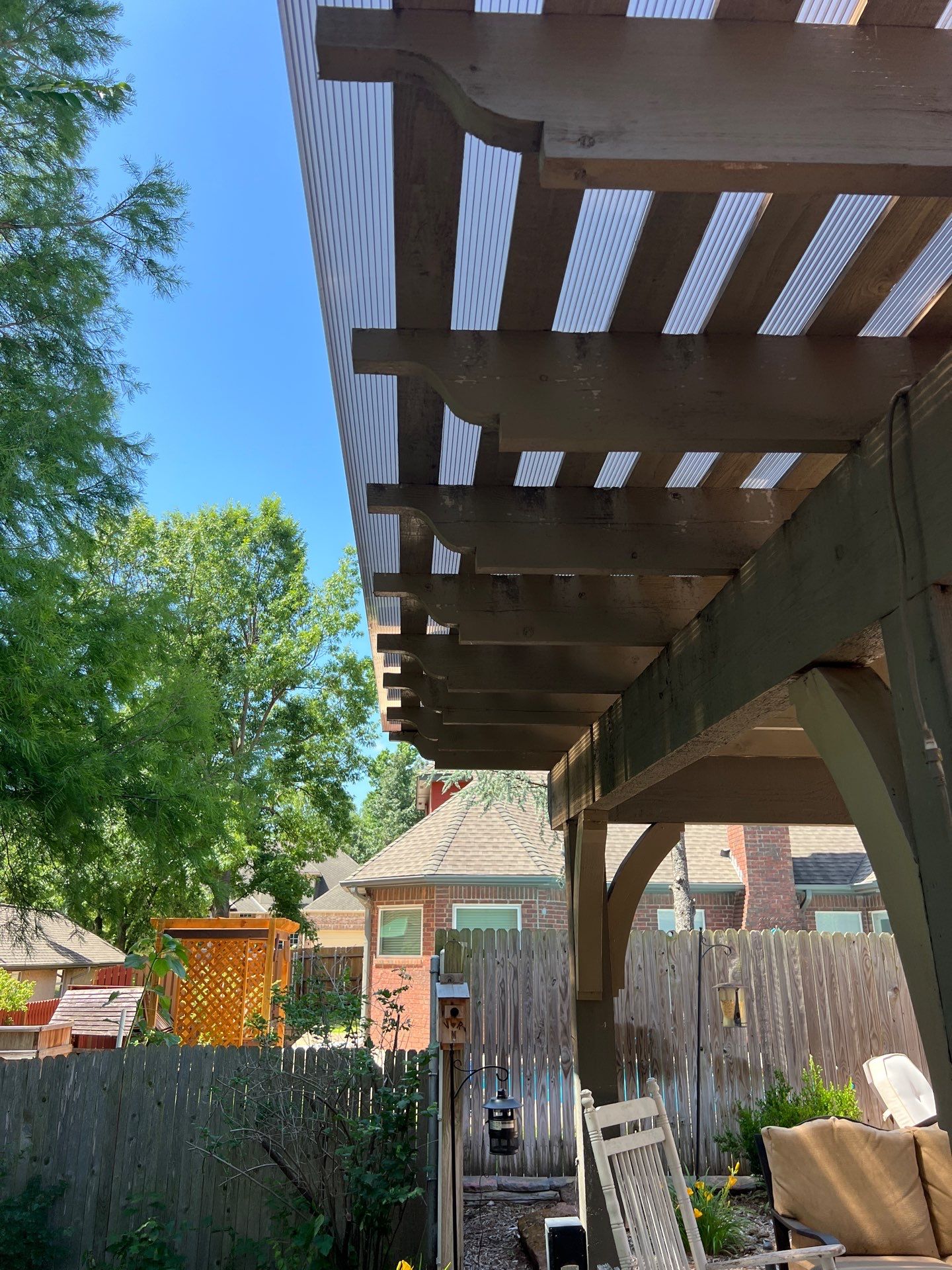 pergola cover install in Edmond by McCann's Roofing and Construction