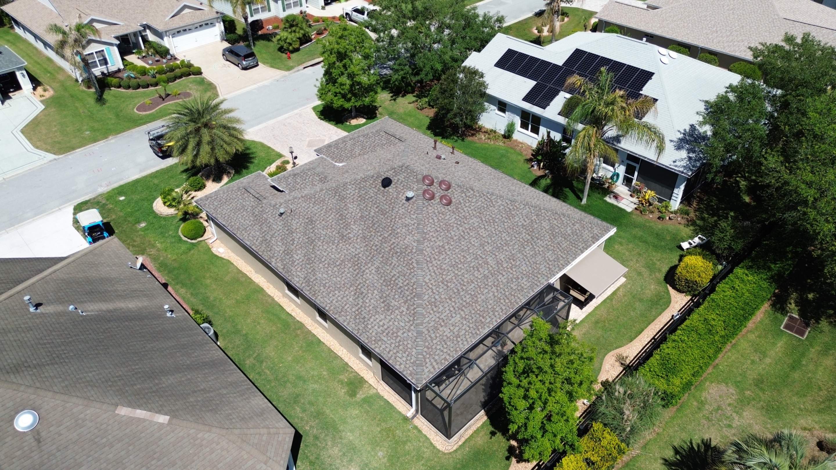 Before and after drone pictures in The Villages FL by Gold Key Roofing