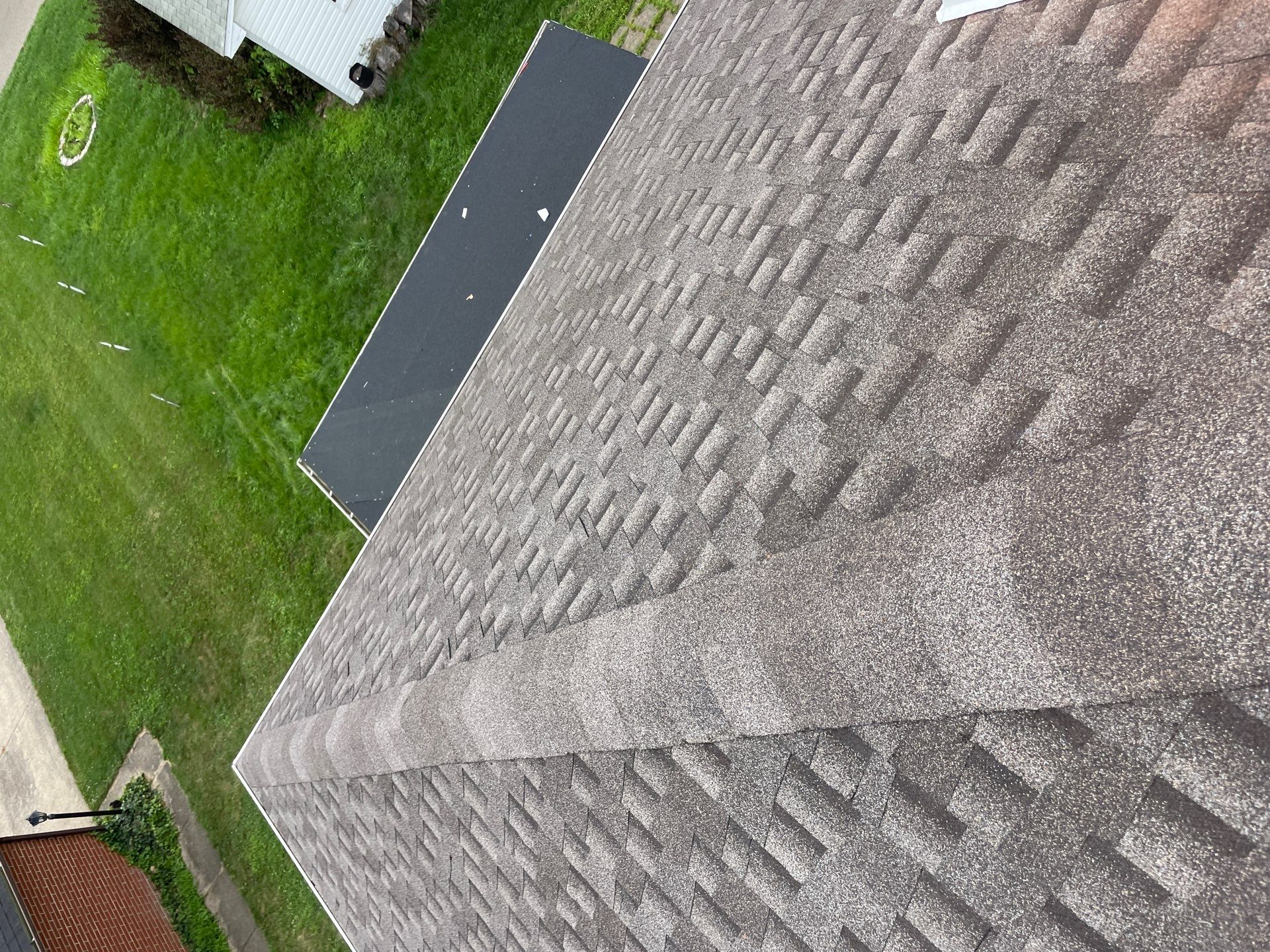 Residential Roofing Installation using GAF Timberline HDZ Charcoal by Rainstoppers Roofing