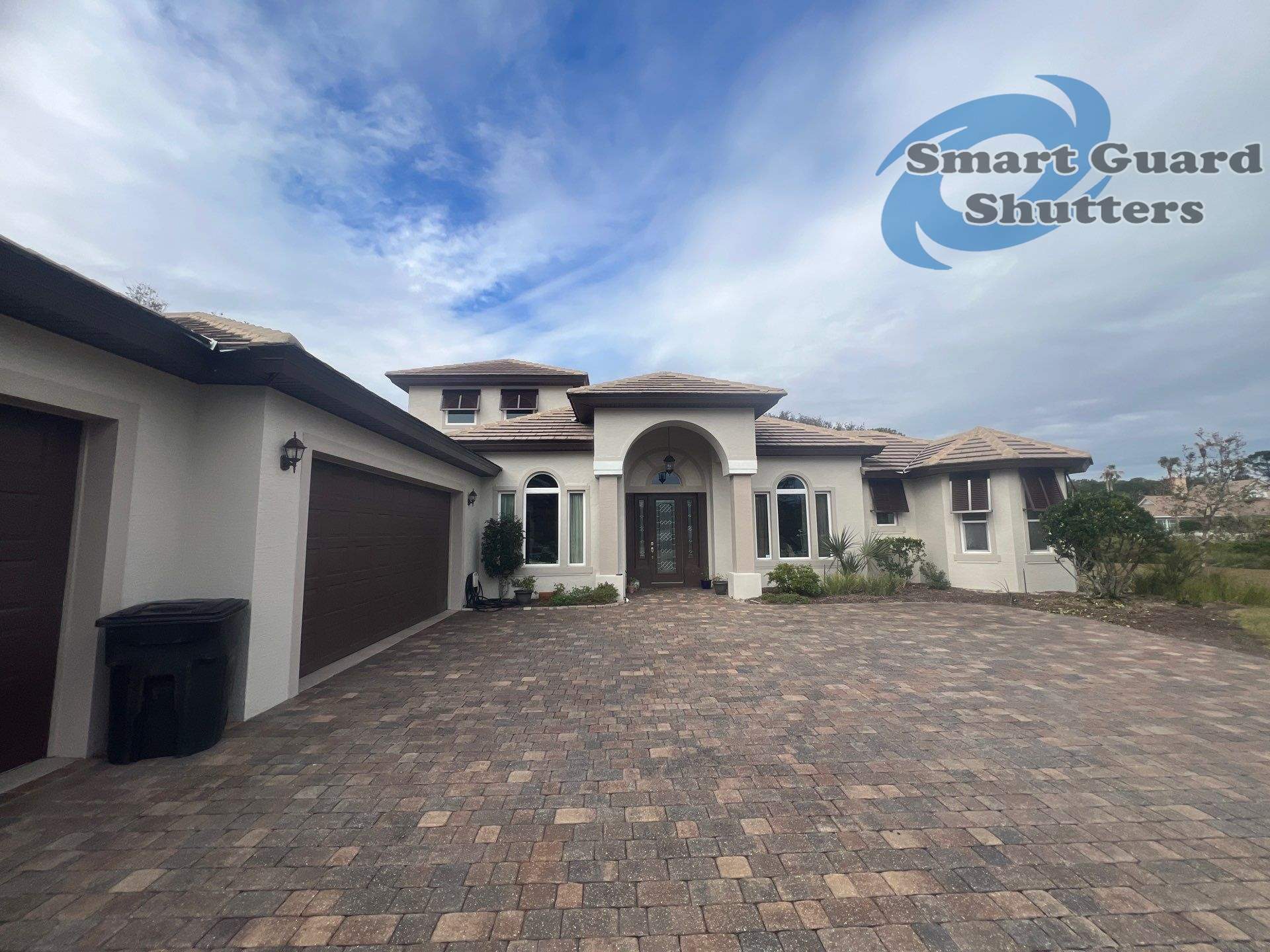 Decorative Bahama Shutters in Chocolate Brown by Smart Guard Shutters