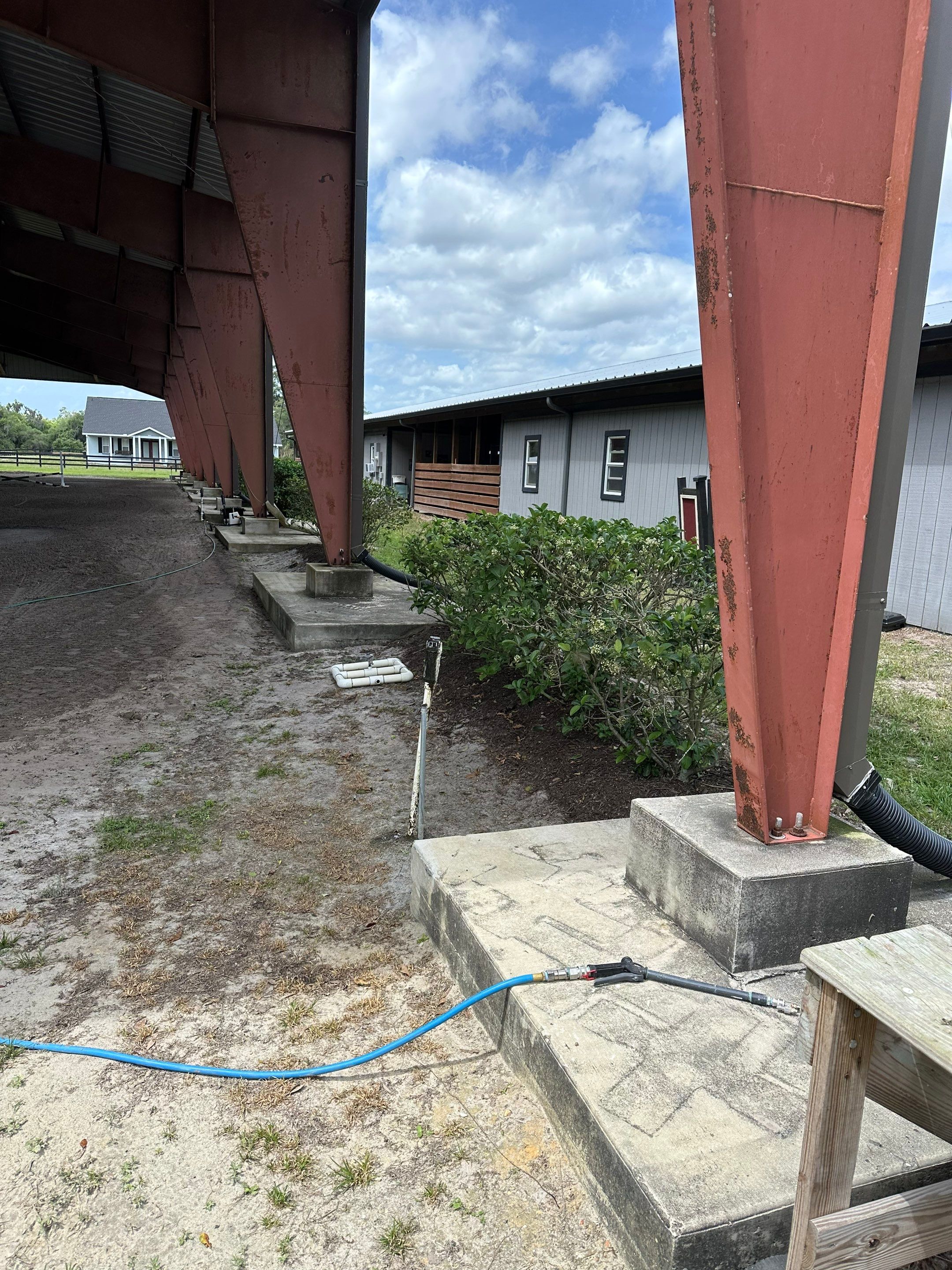 Vinyl Horse Fence & Concrete Pier Cleaning at Lesley Cox Equestrian, Parrish, FL | Sunshine AquaWash by Sunshine AquaWash
