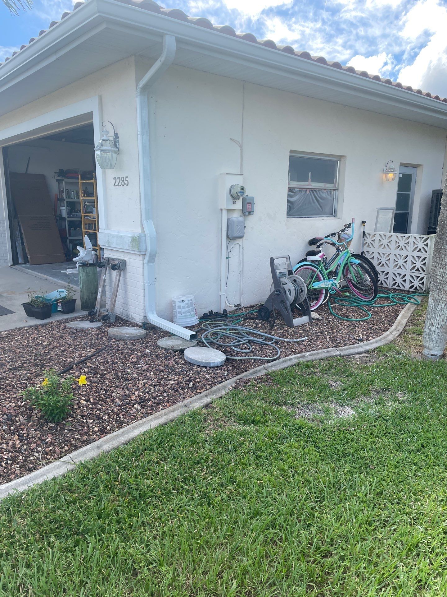 Connect Downspouts to Drain in Punta Gorda FL by Gutter Professors