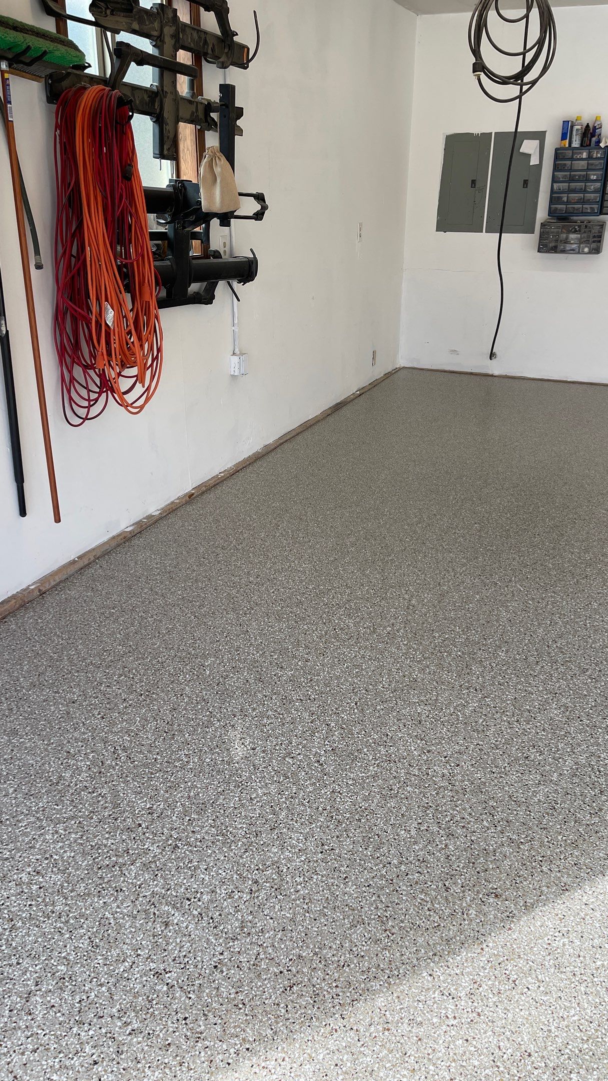 Garage Floor Polyaspartic Coating with Pebble Beach 1/4" Flakes by Croc Coatings, LLC