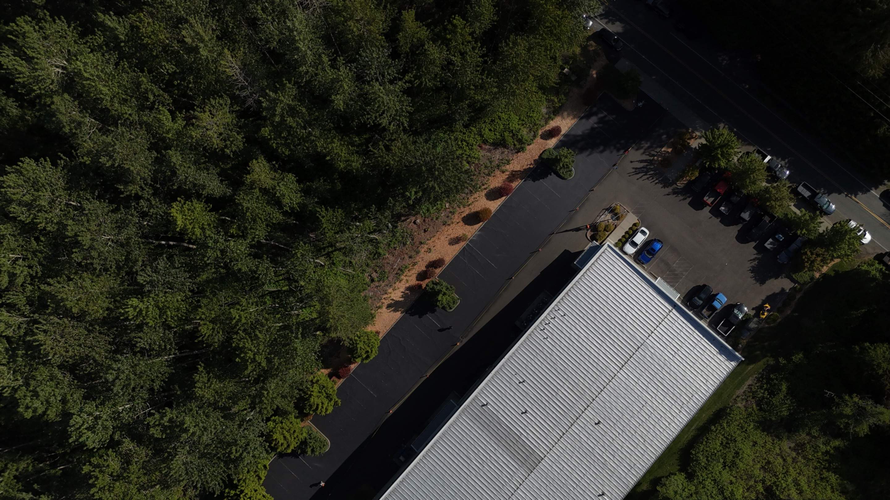 King Machine Business Parking Lot Sealcoat Overlay | Mukilteo by Jireh Asphalt & Concrete Inc 