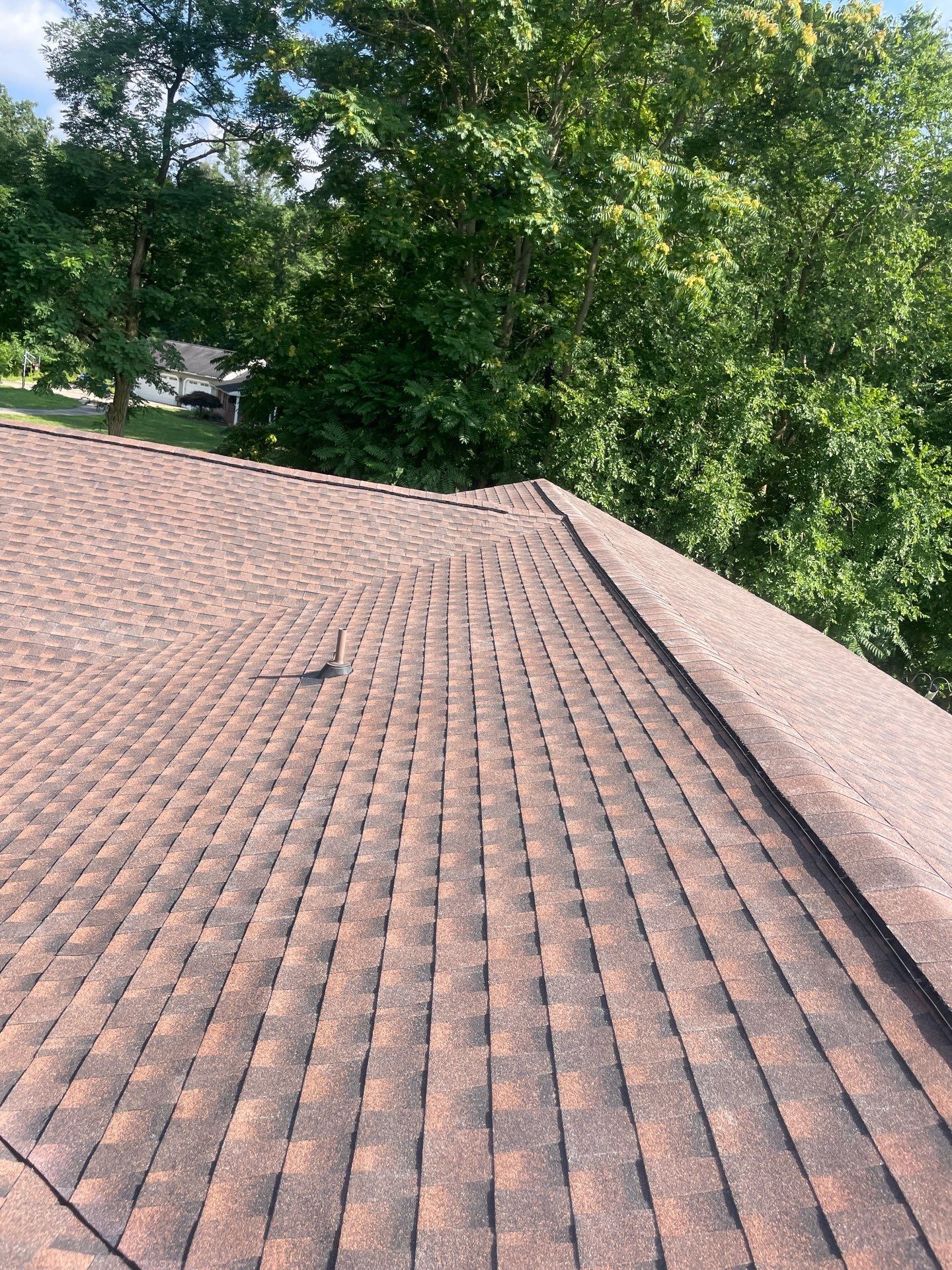 Residential Roofing Installation using GAF TImberline HDZ Hickory by Rainstoppers Roofing