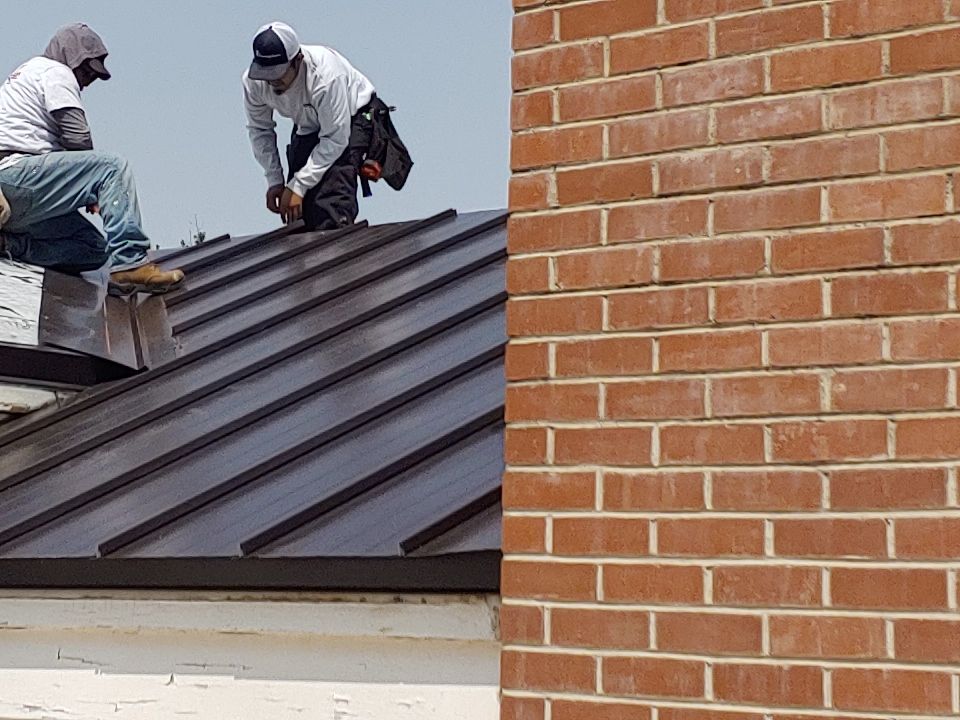 Residential Roofing Installation using Standing seam metal roofing system by Straight Edge Roofing Inc