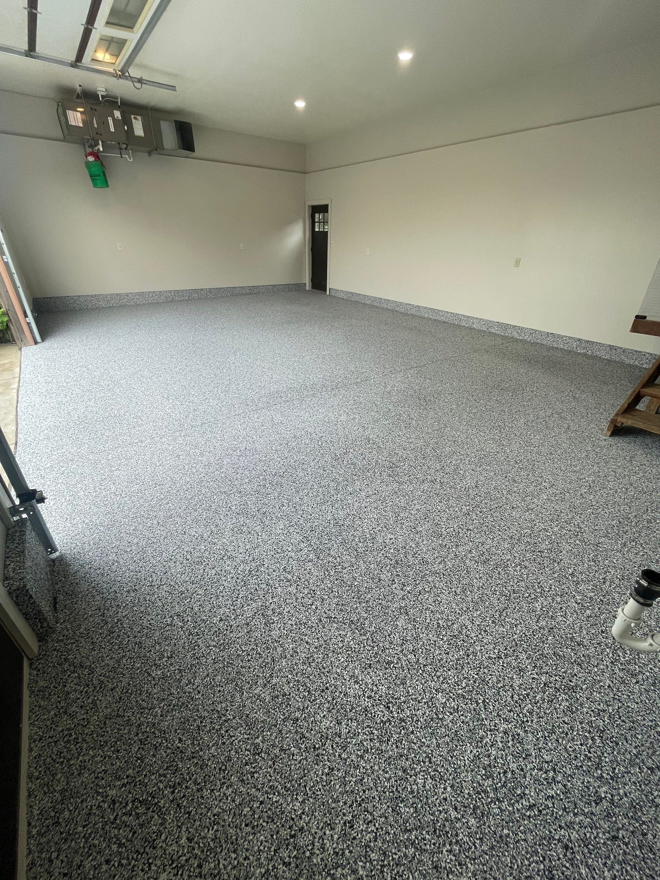 Domino Flake Floor Coating and Crack Repair in Chancellor by Select Painting, Coatings & Garage Cabinets