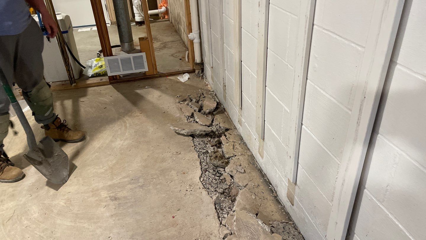 Interior Drain Tile & Buried Discharge in St. Anthony, MN by Waterproofing Northeast