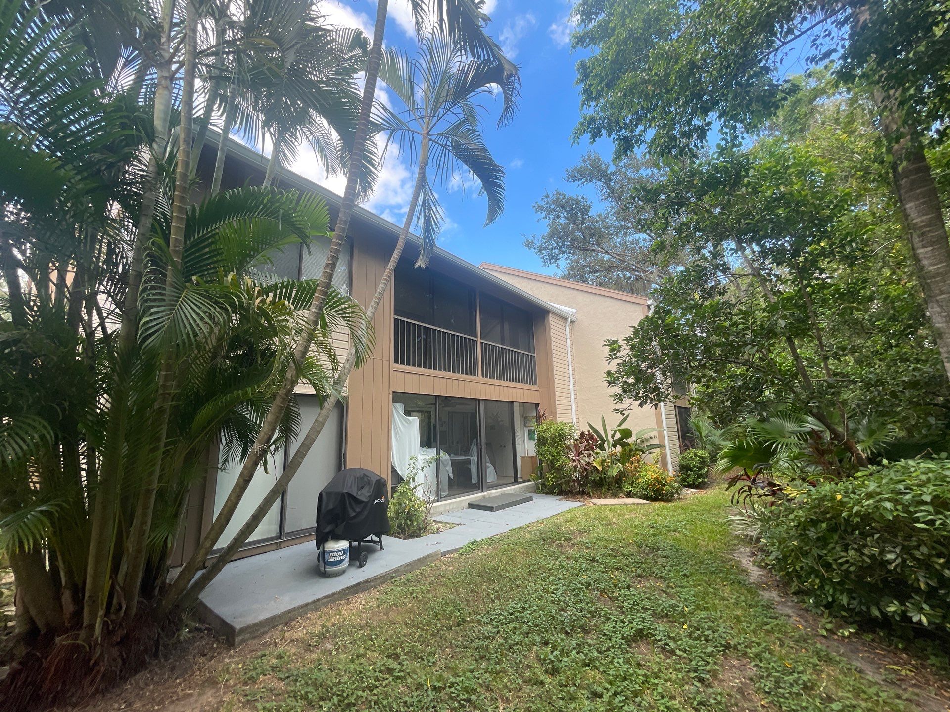 Clean Gutters and Roof in Sarasota FL by Gutter Professors