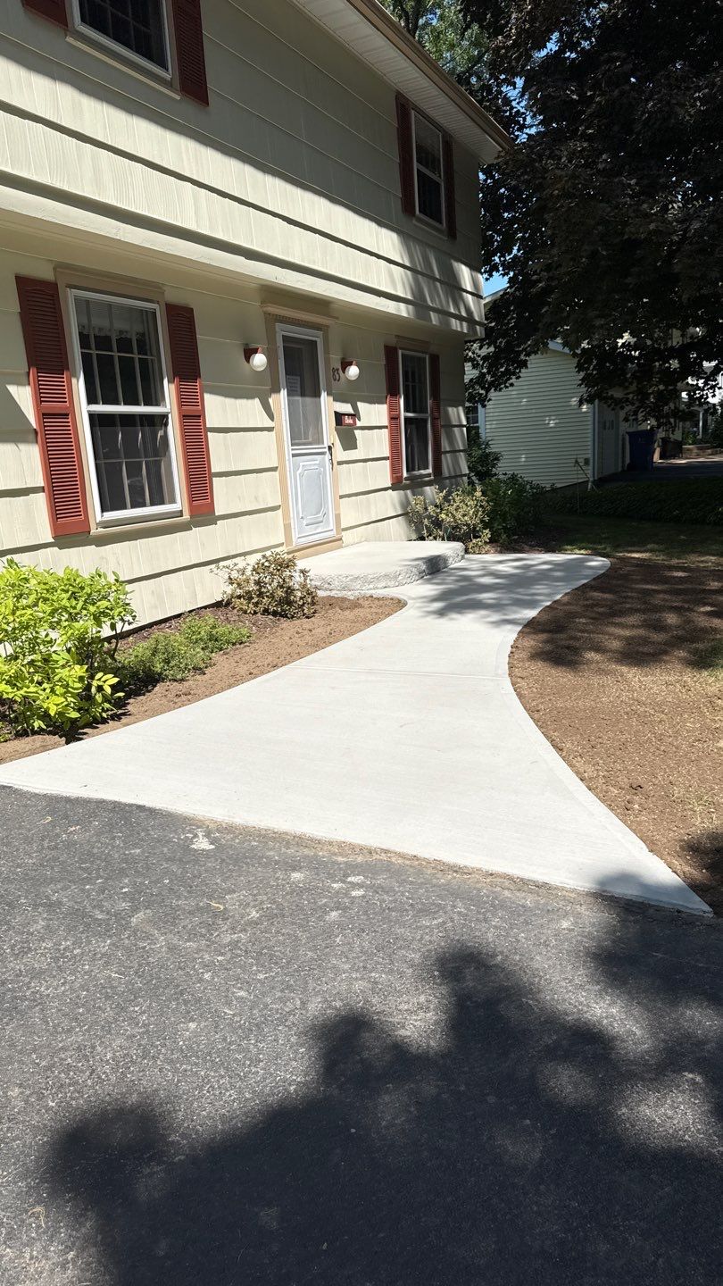 Broom Finish Walkway  by NG Masonry & Construction LLC