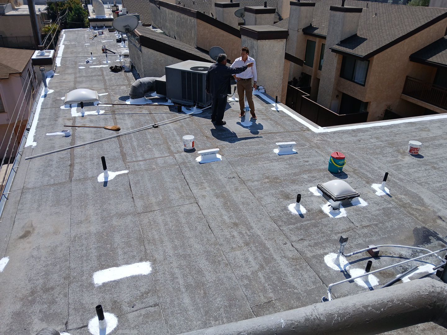 Apartment Building Silicone Coating by Hull Brothers Roofing