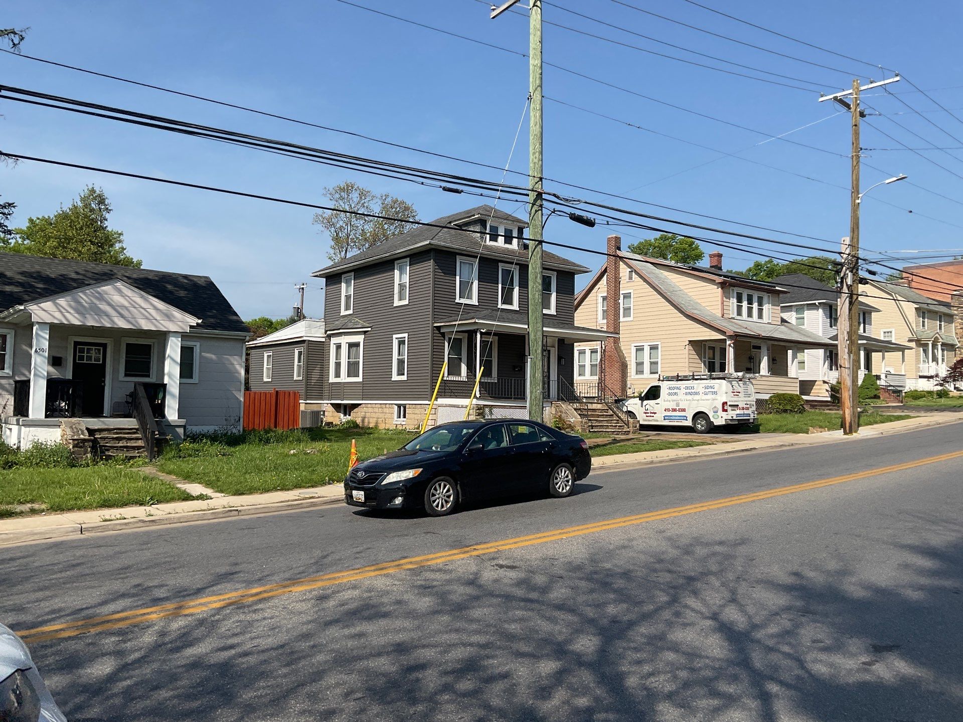 New siding & New Gutters by Alpha Design Services