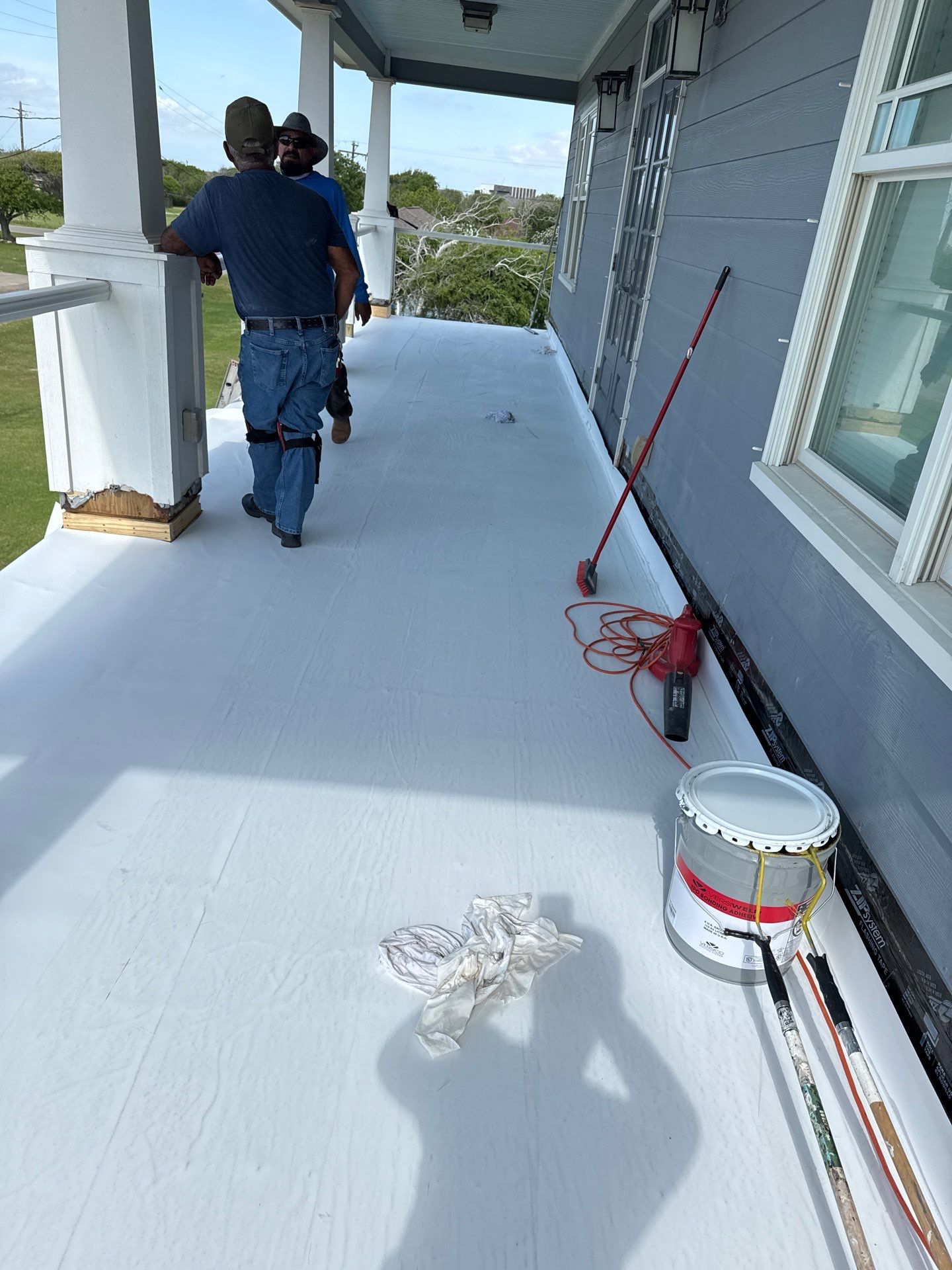 Walk Out Patio Cover by Bayfront Roofing and Construction