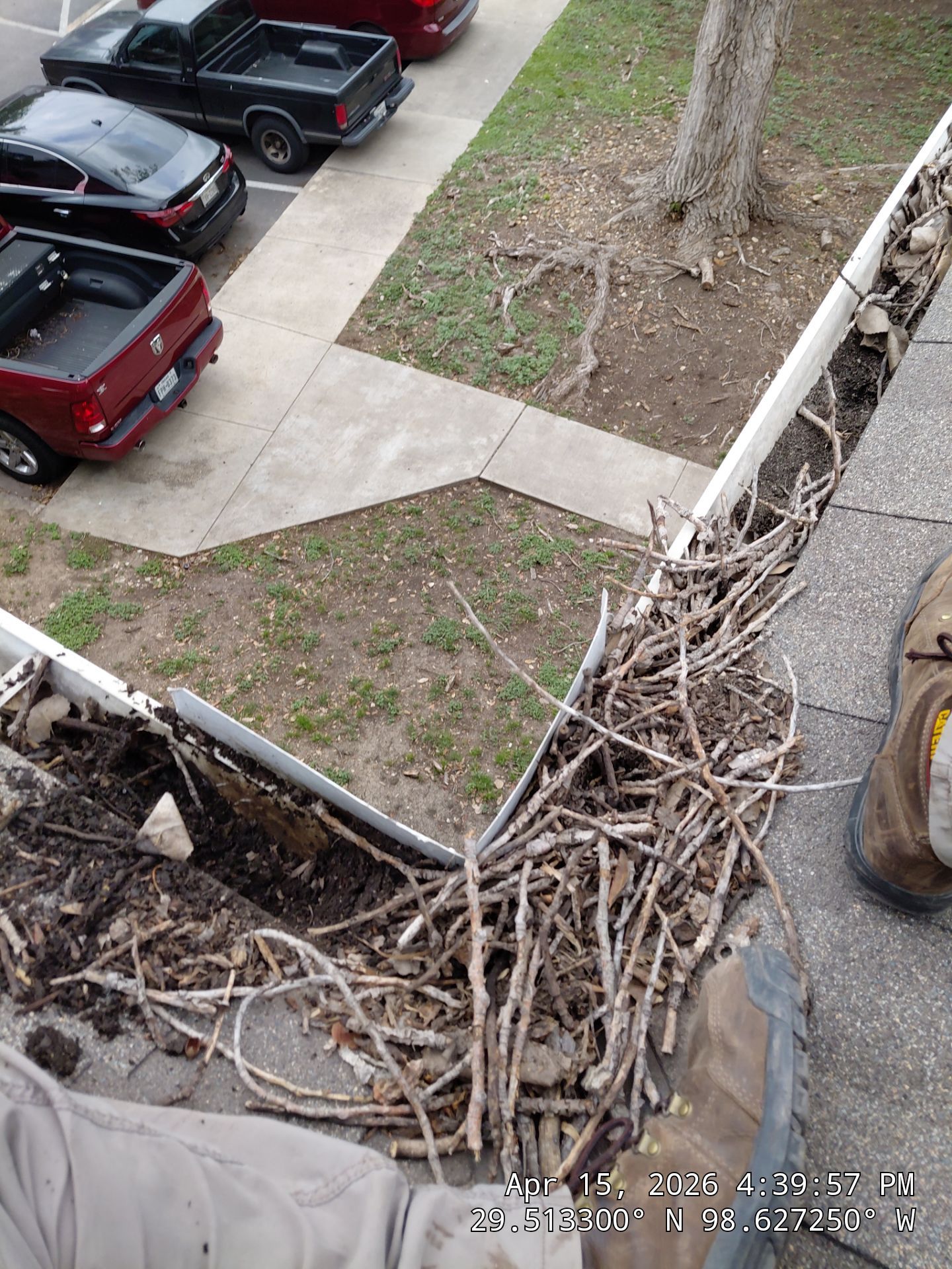 Commercial gutter cleaning San Antonio before photo with filled gutters