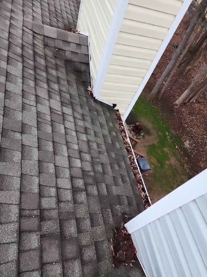 Gutter Cleaning using water by Power Wash Masters LLC