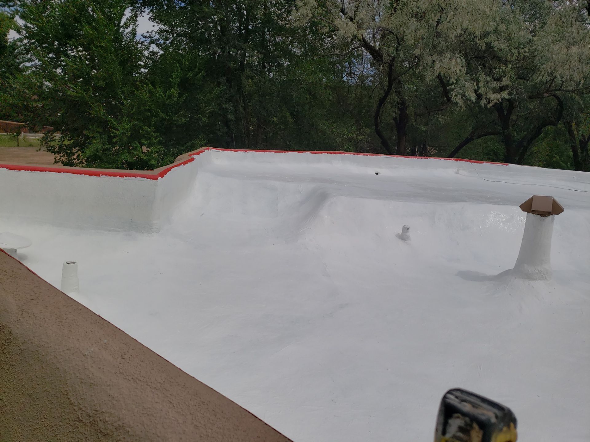 Residential roof application by SPF Services 