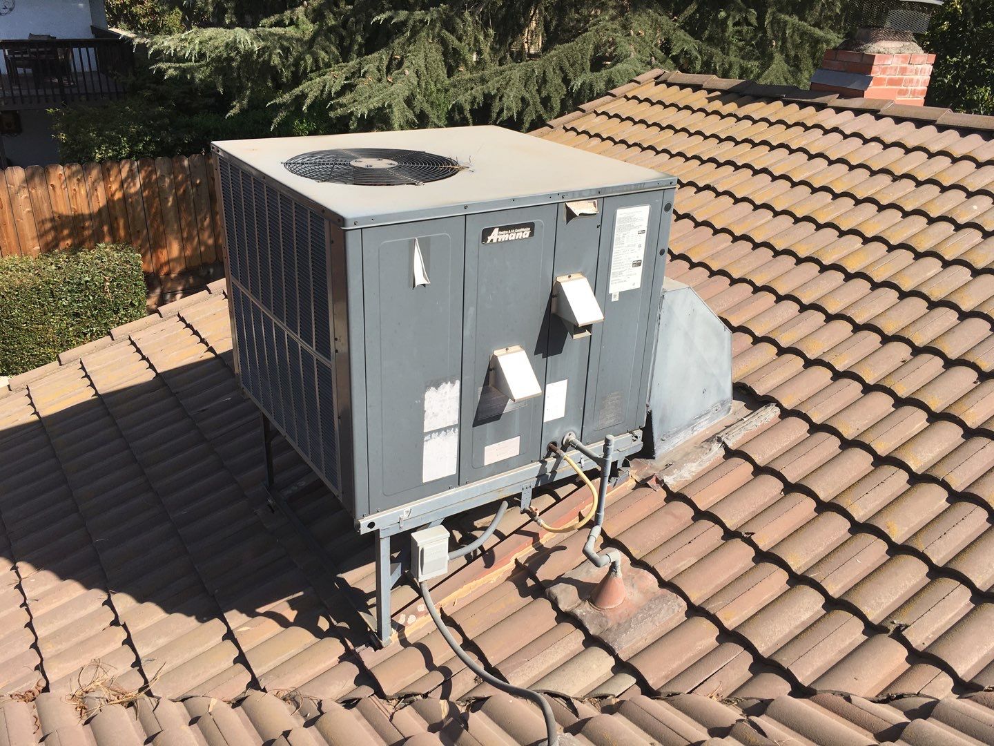 Tile roof remodel/ install OSB sheathing under tile and replace using OSB board with new underlayment, tile, and battens by Straight Edge Roofing Inc