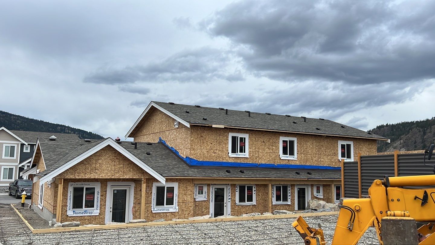 Residential Roofing Installation using OC Driftwood shingles by Top Notch Roofing Inc