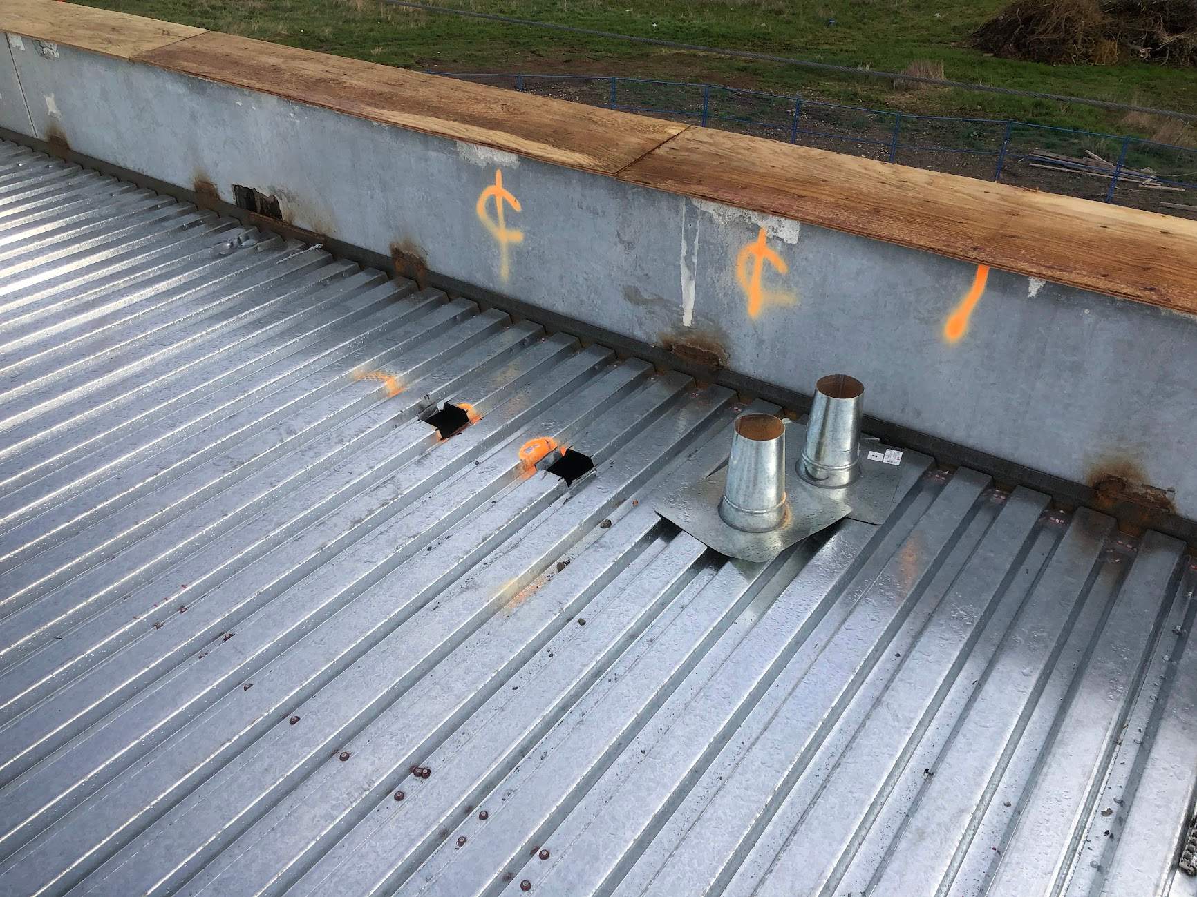 Commercial Roofing Installation using EPDM loose lay with balast by Top Notch Roofing Inc