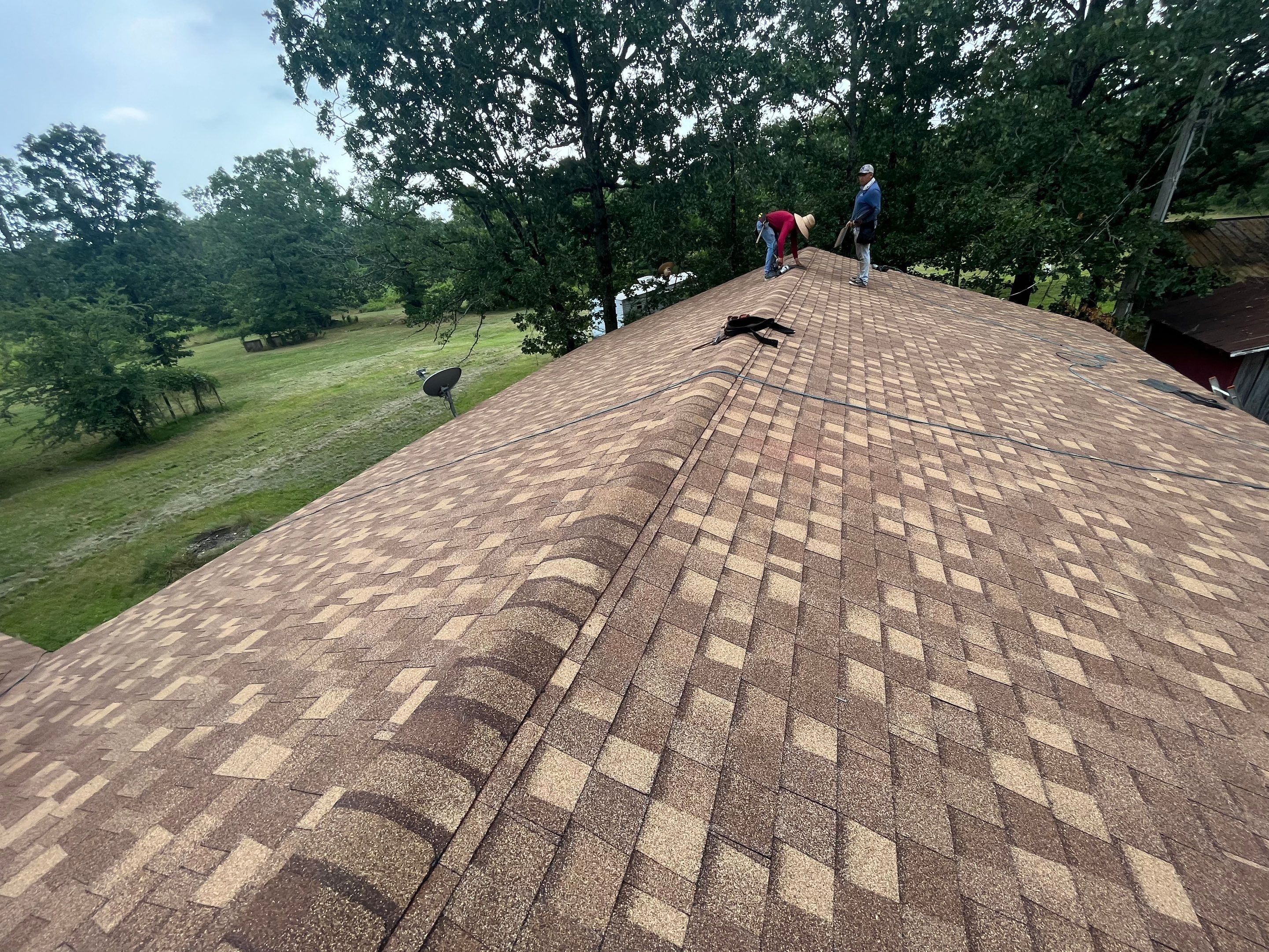 Storm Restoration Reroof: 25 Year 3-Tab Shingle by Hostetler Roofing