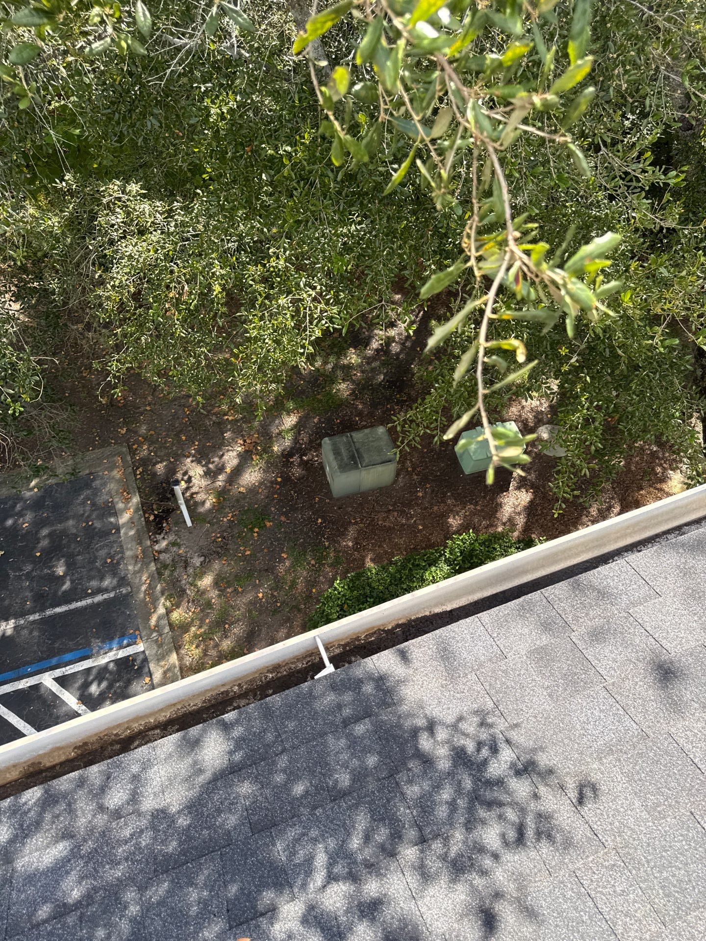 HOA gutter cleaning in St. Johns County & Ponte Vedra, FL, after  photo showing full gutters.