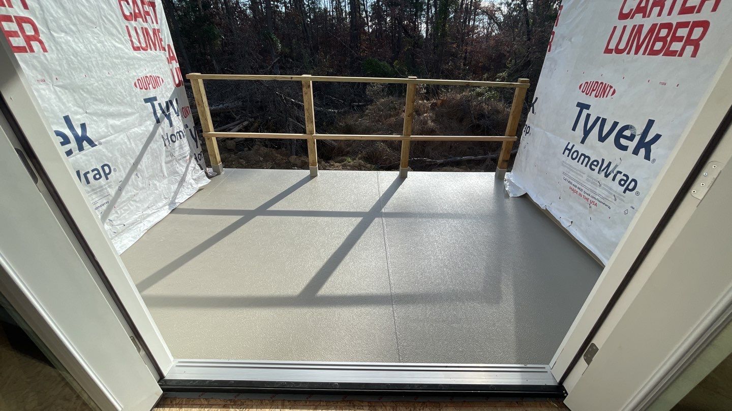 Porch using Duradek by RJC General Construction, LLC.