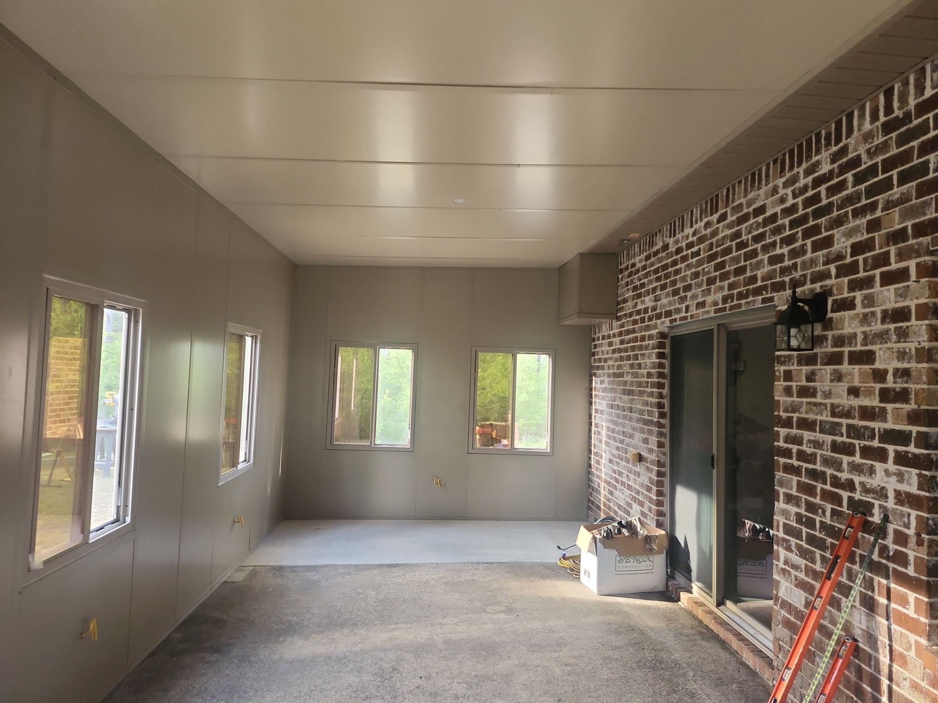 Patio to Glass Room Conversion by Titan Sunrooms